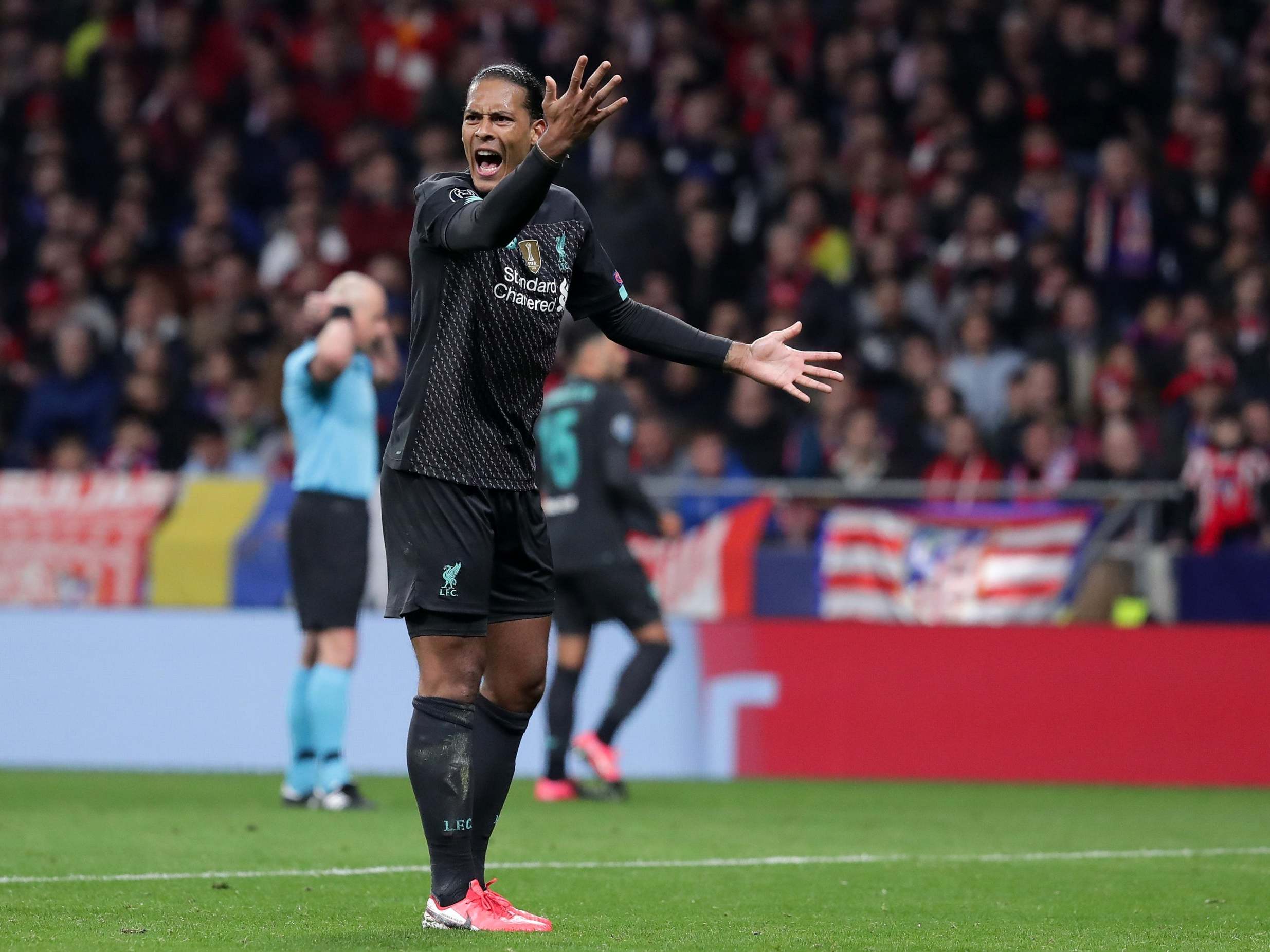 Virgil van Dijk of Liverpool reacts