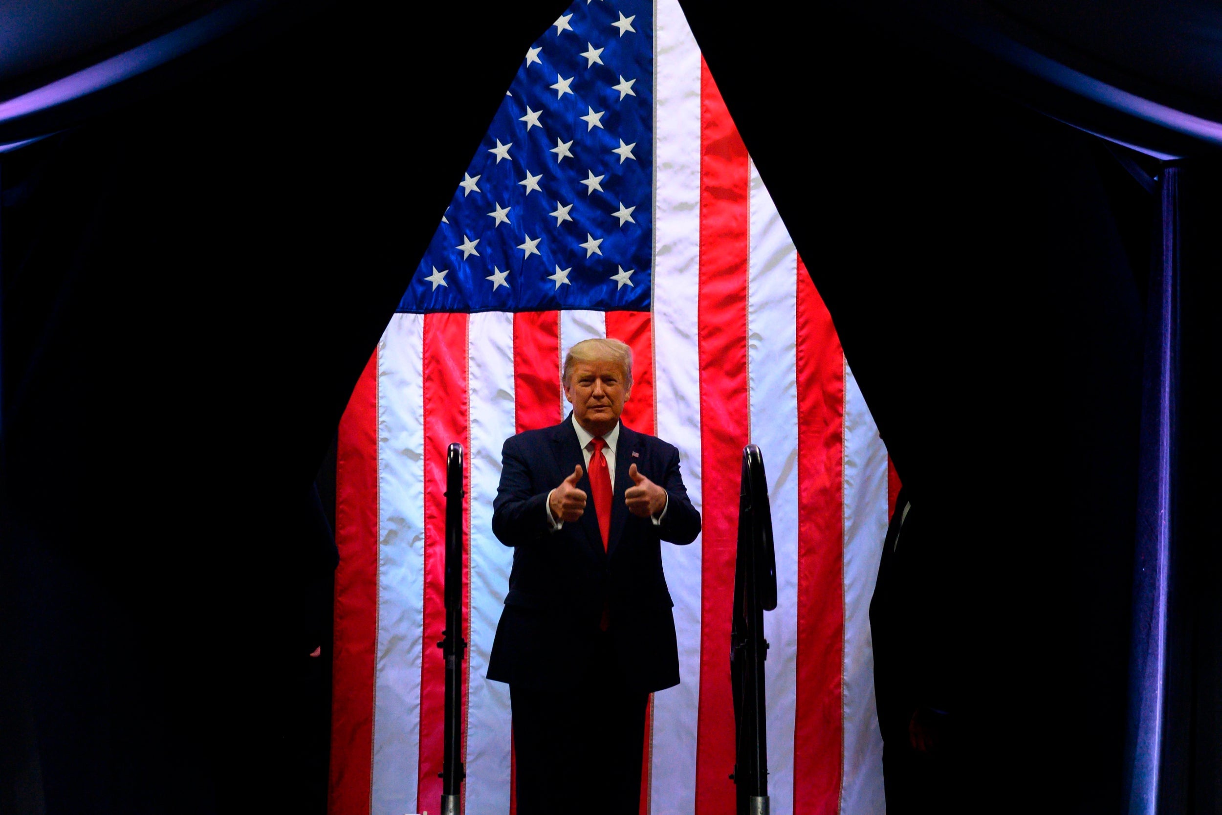 Donald Trump arrives at a Keep America Great rally in Phoenix, Arizona