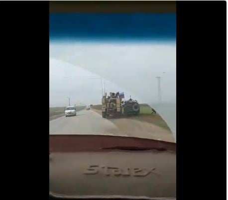 A US MRAP forces a Russian Tigr 4x4 off road in Syria after the Russian vehicle attempts to pass.