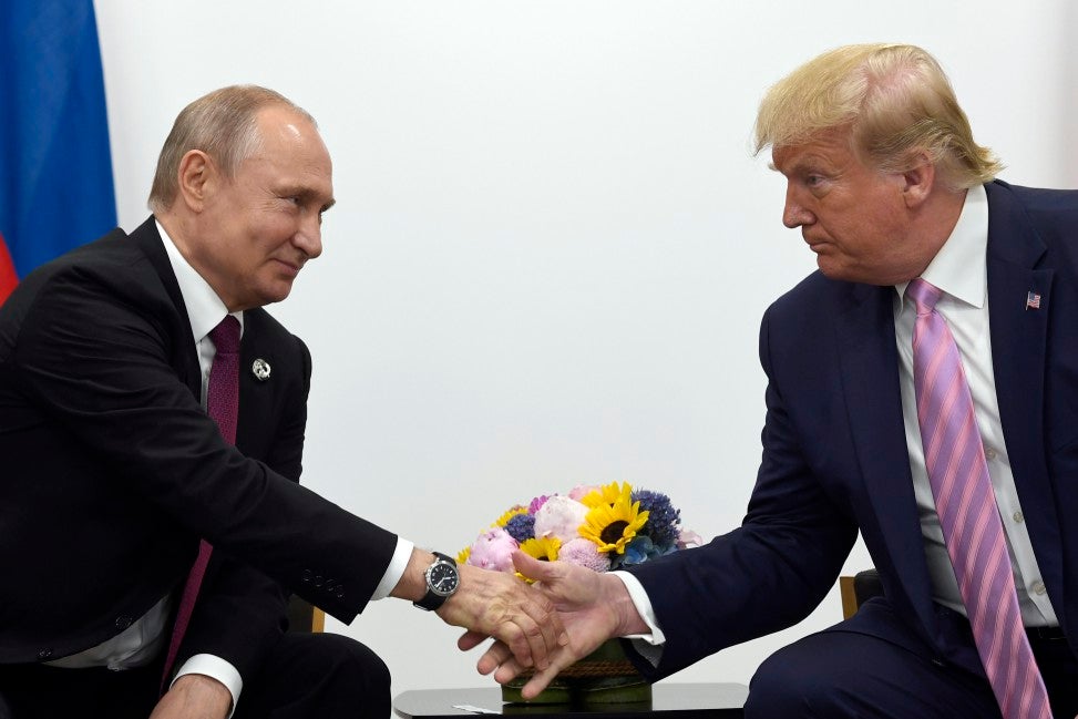 Donald Trump shakes hands with Russian president Vladimir Putin during a bilateral meeting on the sidelines of the G-20 summit in Osaka, Japan 28 June 2019