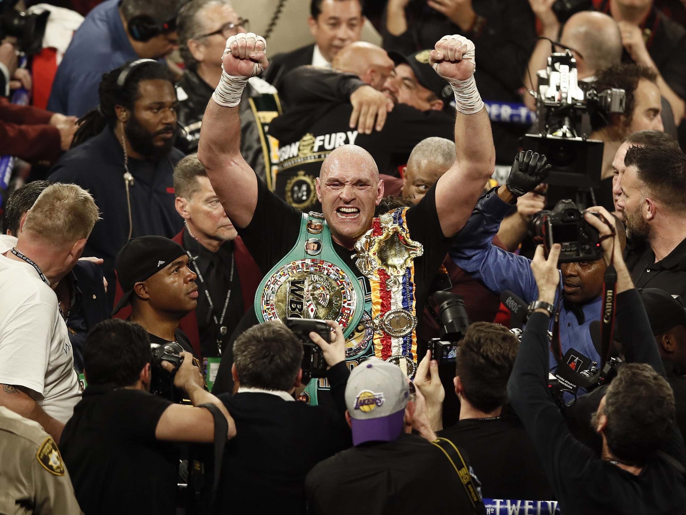 Tyson Fury reacts after defeating Deontay Wilder