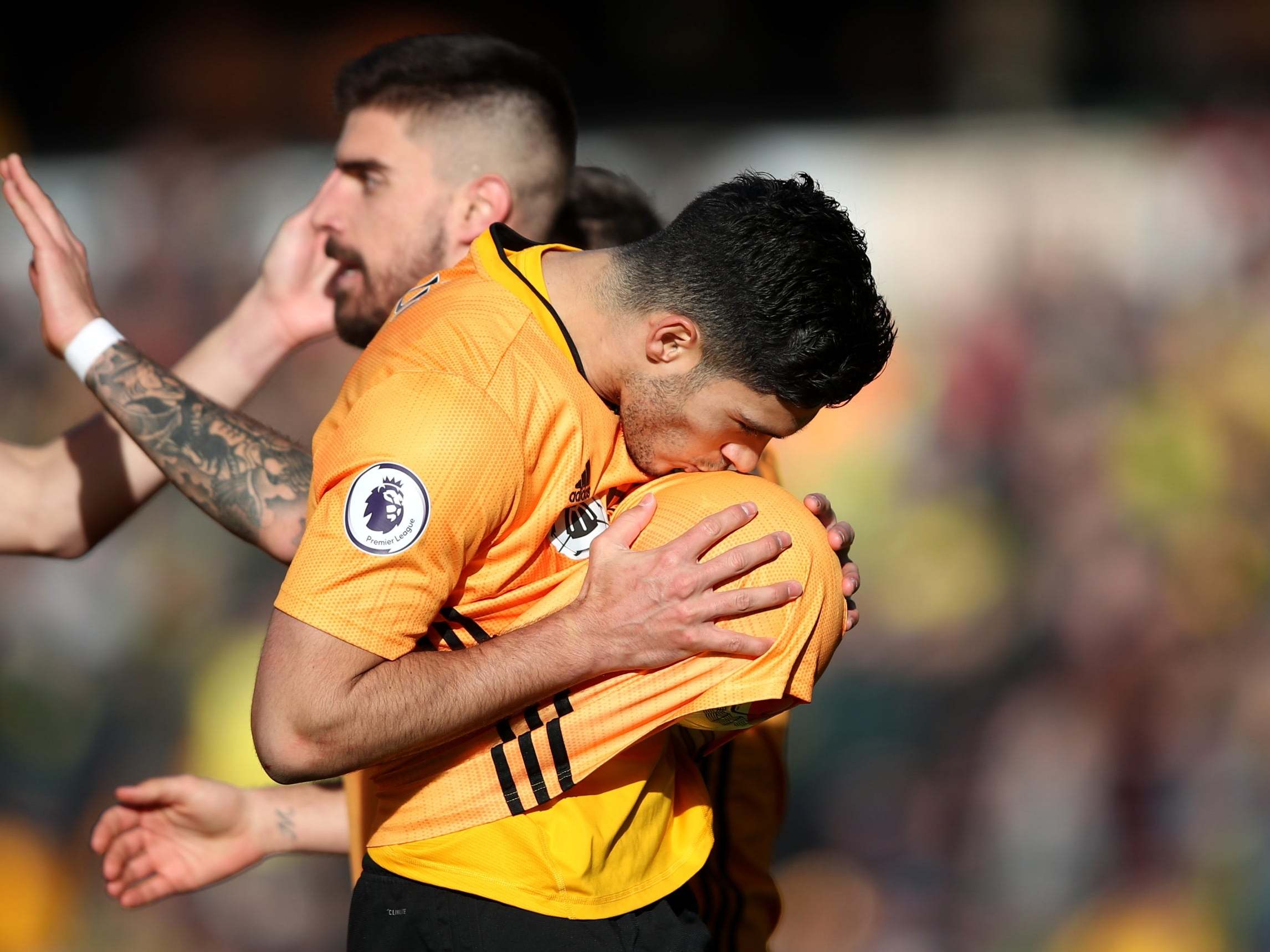 Raul Jimenez celebrates scoring Wolves' third (Getty)