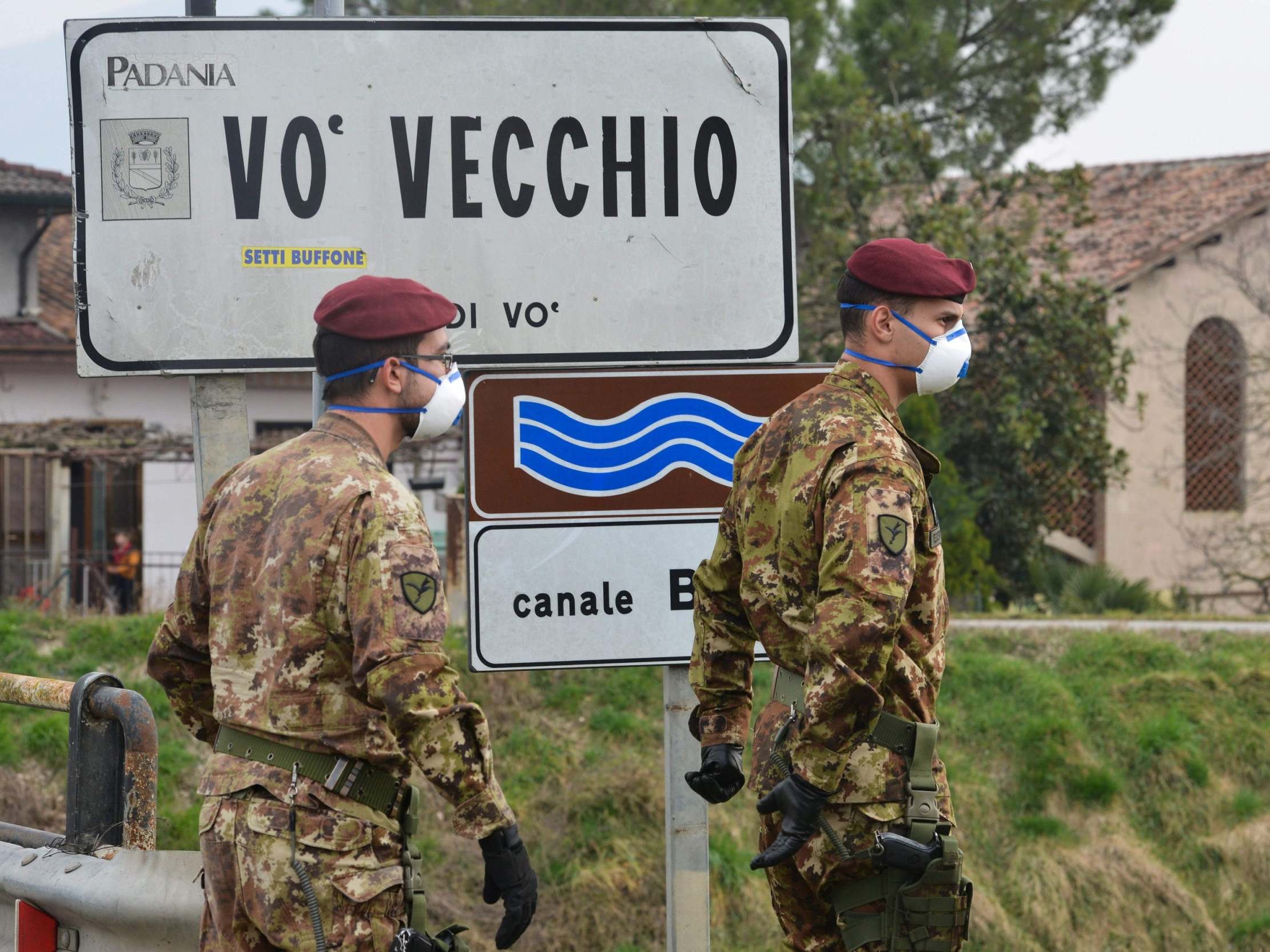 Italian soldiers at a check-point in Vo Vecchio, a ‘red zone’ town (AFP/Getty)