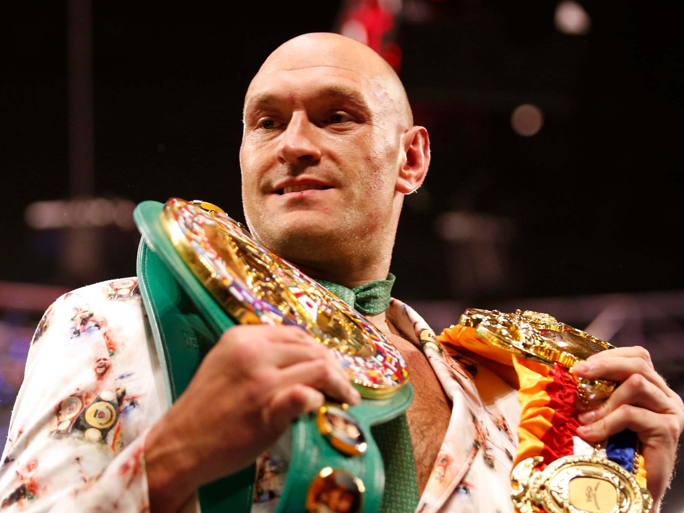 Fury poses with his belts