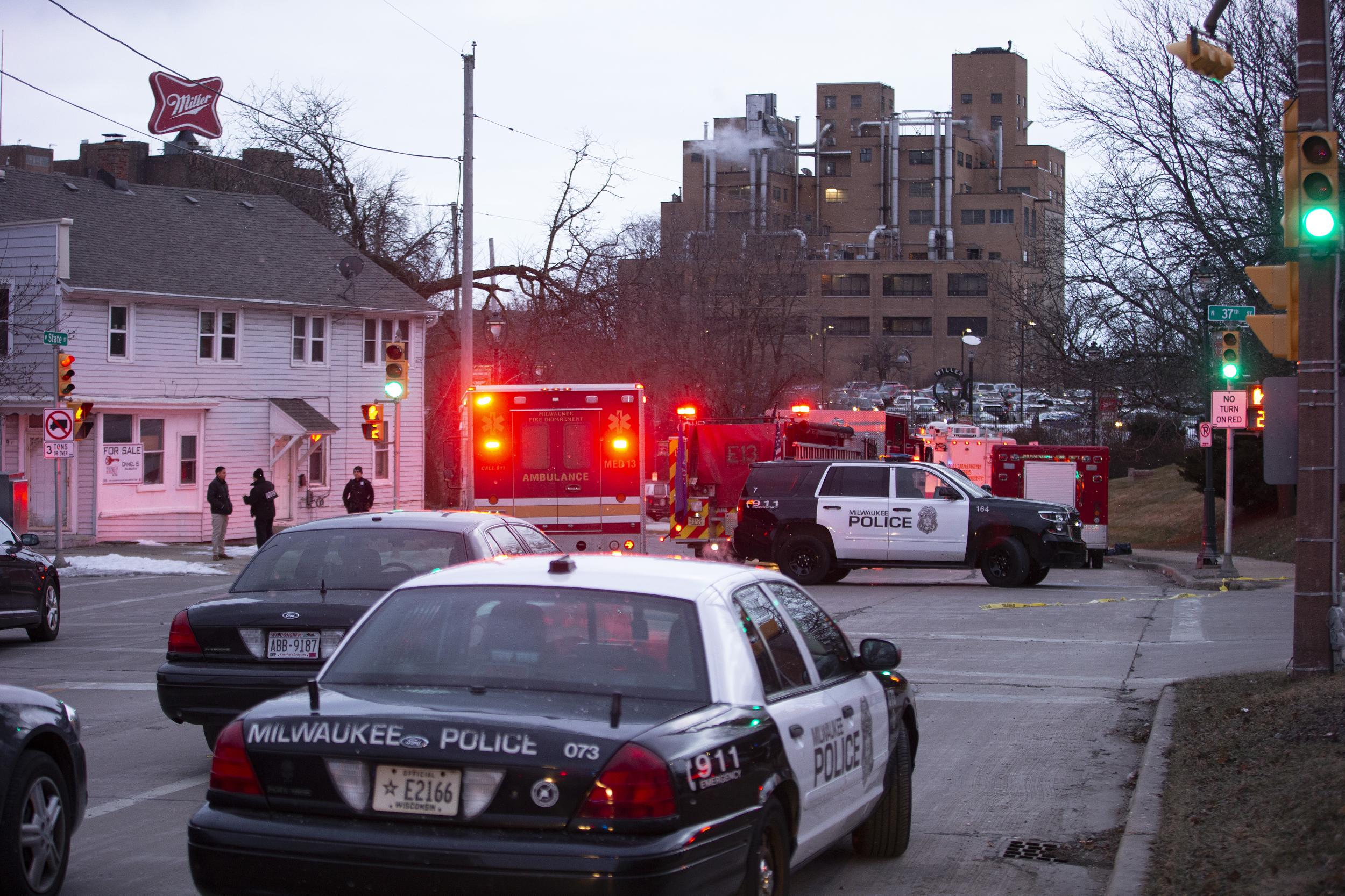 Police cars gather in thw aftermath (Getty)