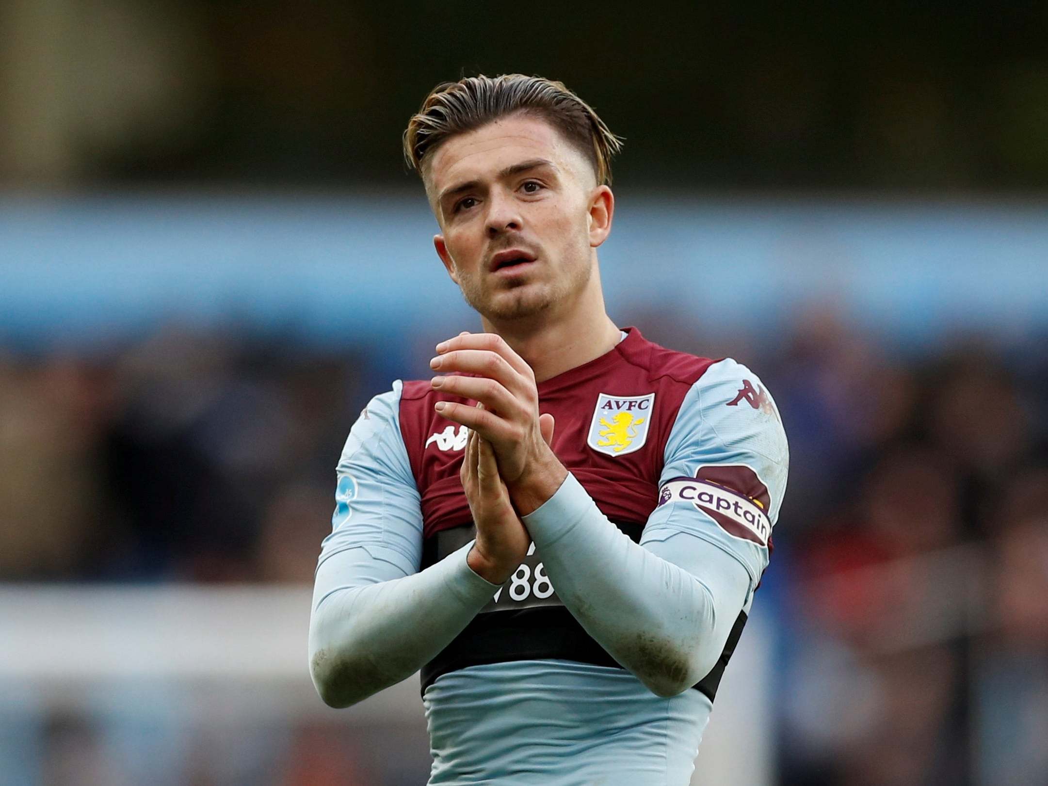 Aston Villa's Jack Grealish looks dejected