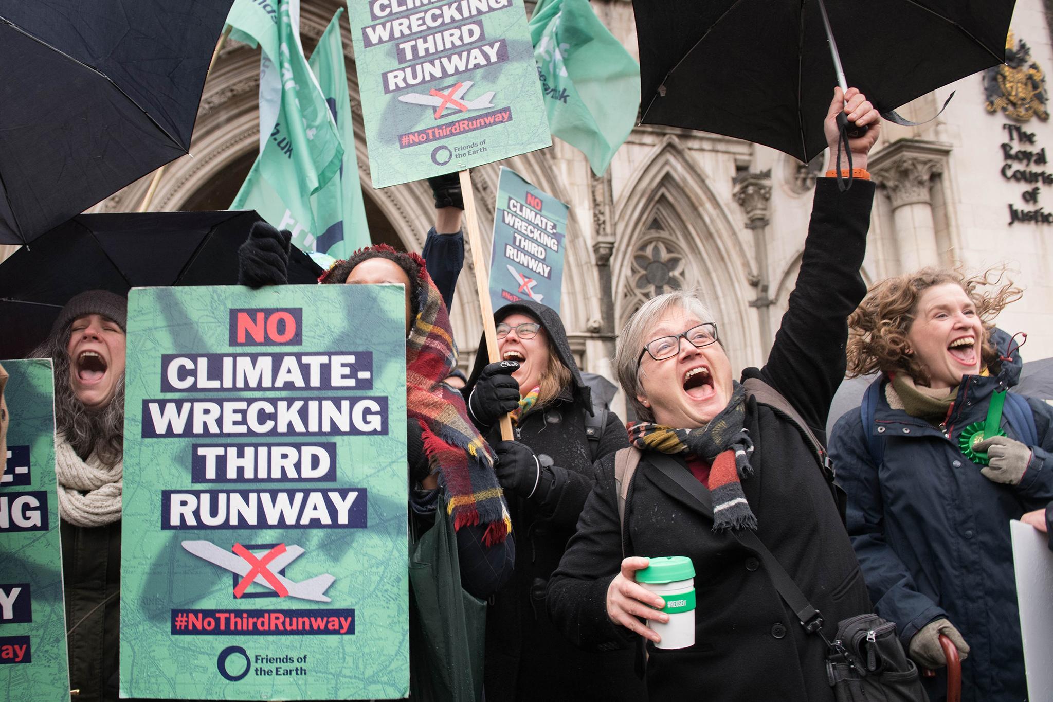 Campaigners celebrate at the Royal Courts of Justice