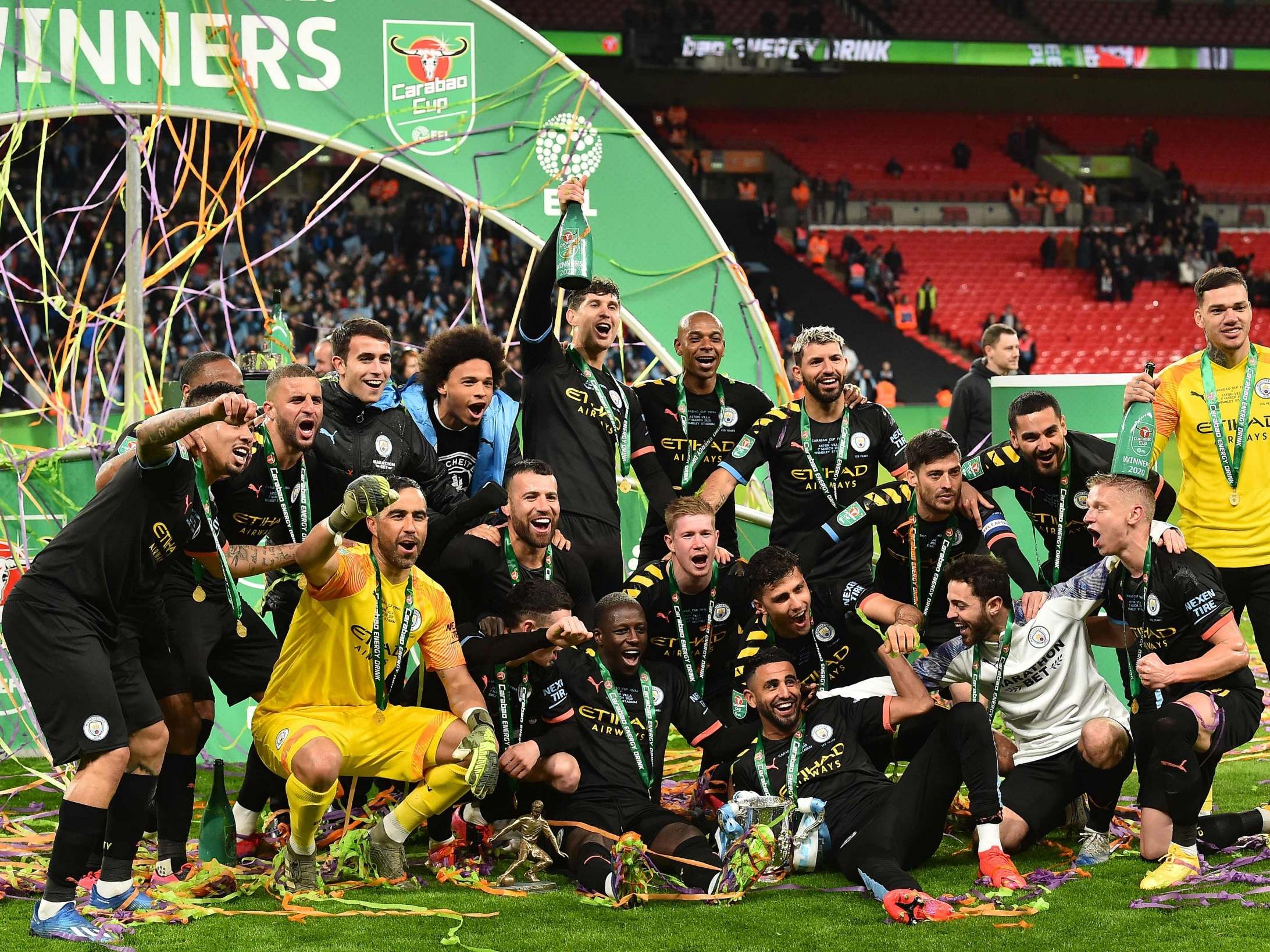 Manchester City's players celebrate with the Carabao Cup