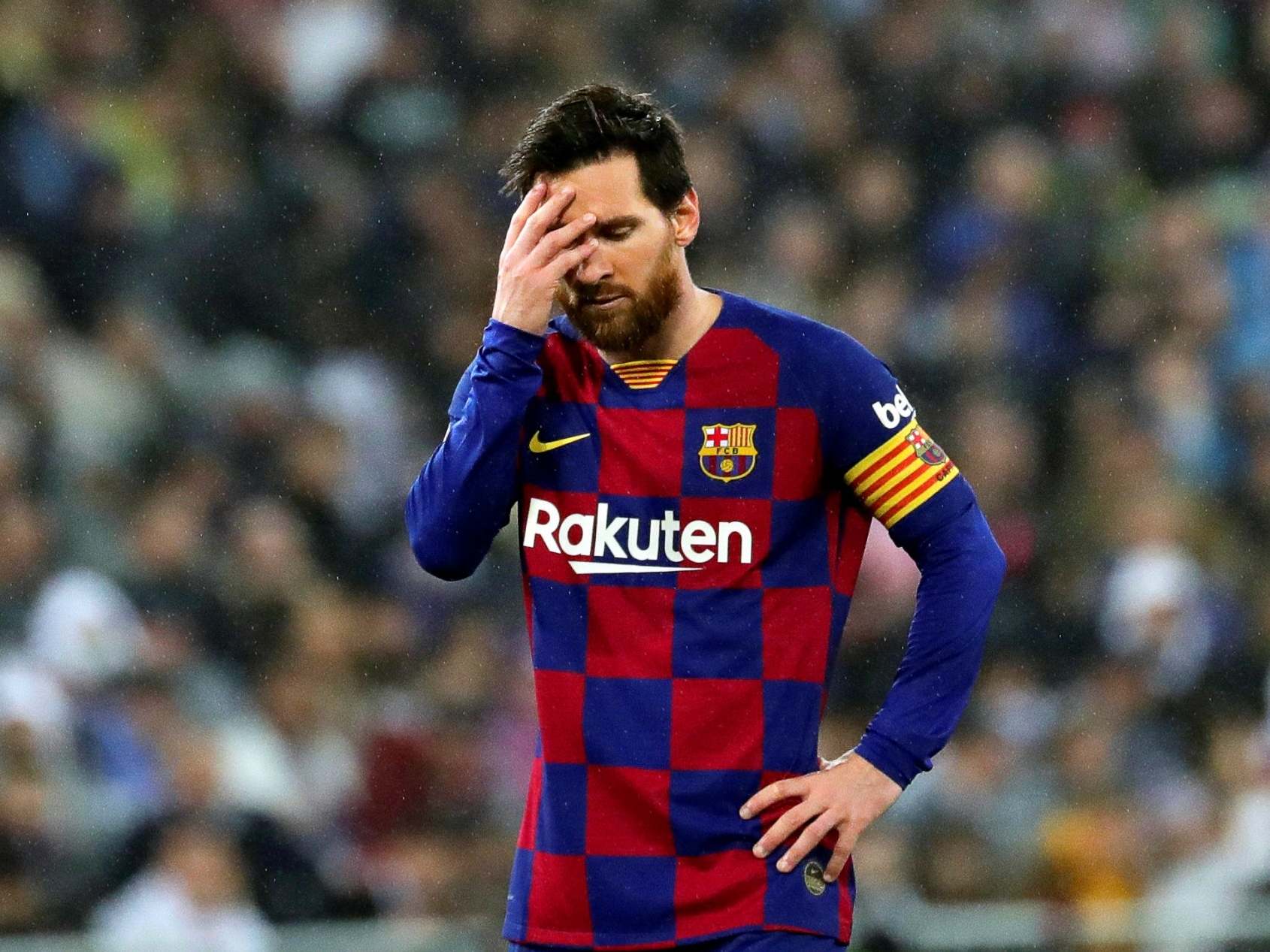 Lionel Messi reacts to Barcelona's El Clasico defeat