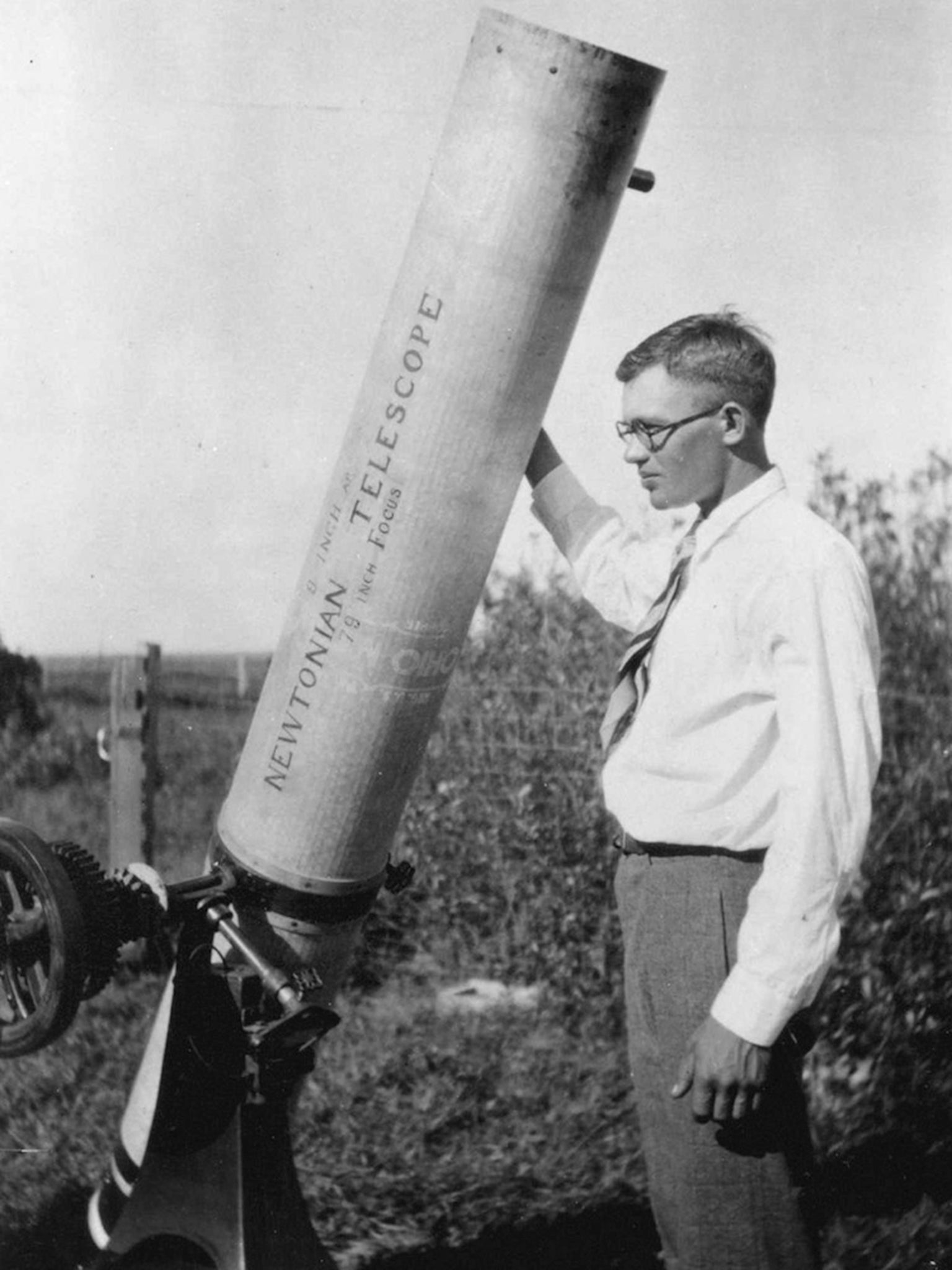 Tombaugh, pictured in June 1930 with his homemade 9in telescope