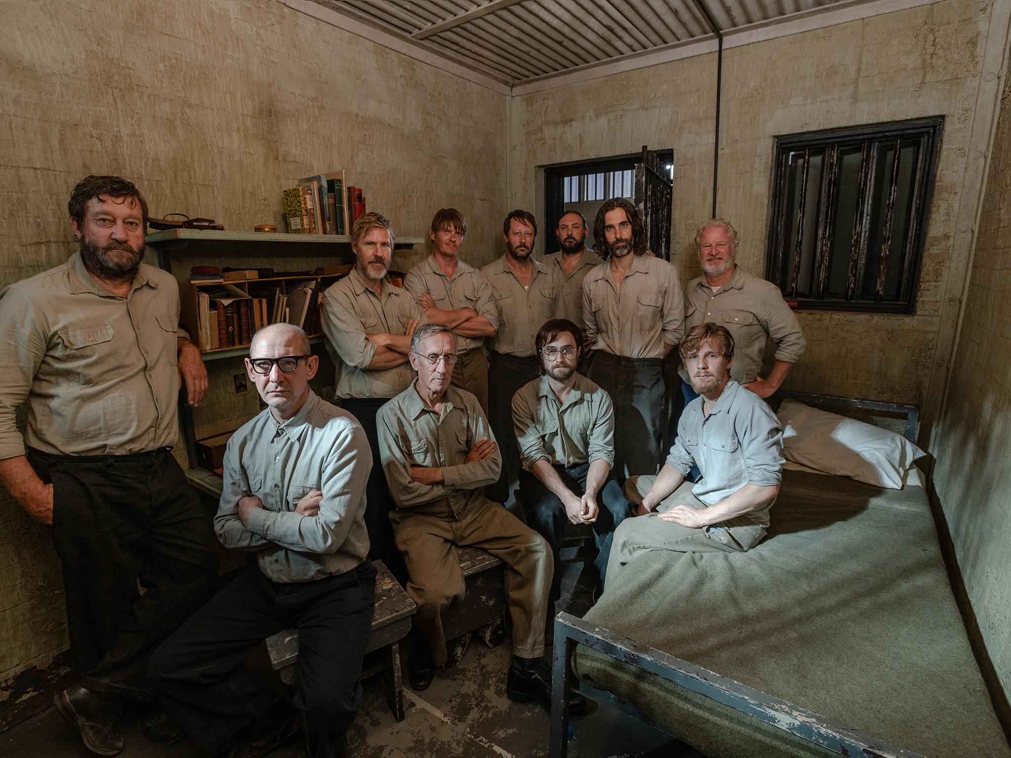 Tim Jenkin (seated second from left) with Daniel Radcliffe, who plays him in the movie, and other cast members