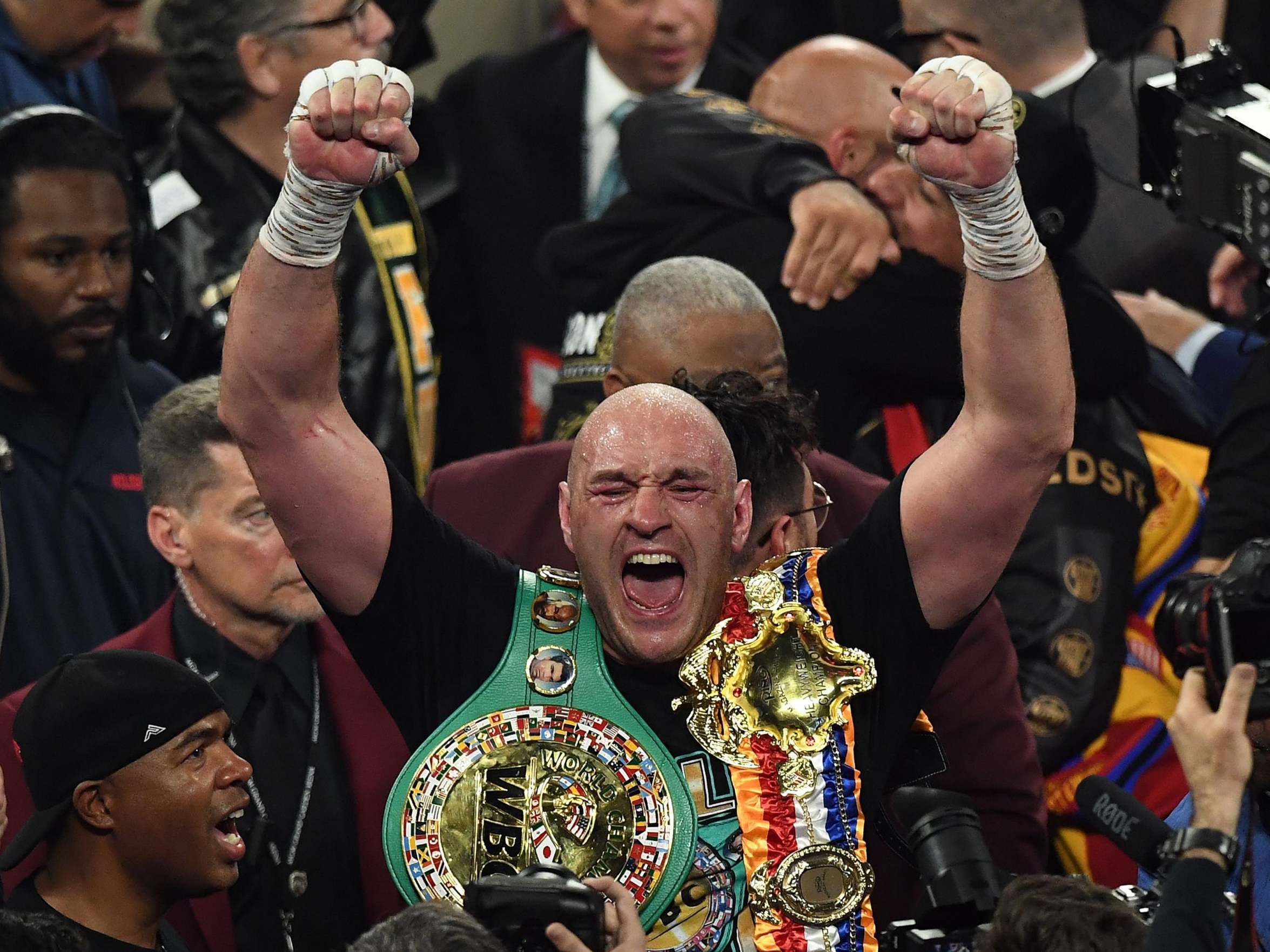 Fury celebrates his victory over Wilder