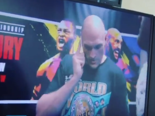 Fury calls his father after winning the world title