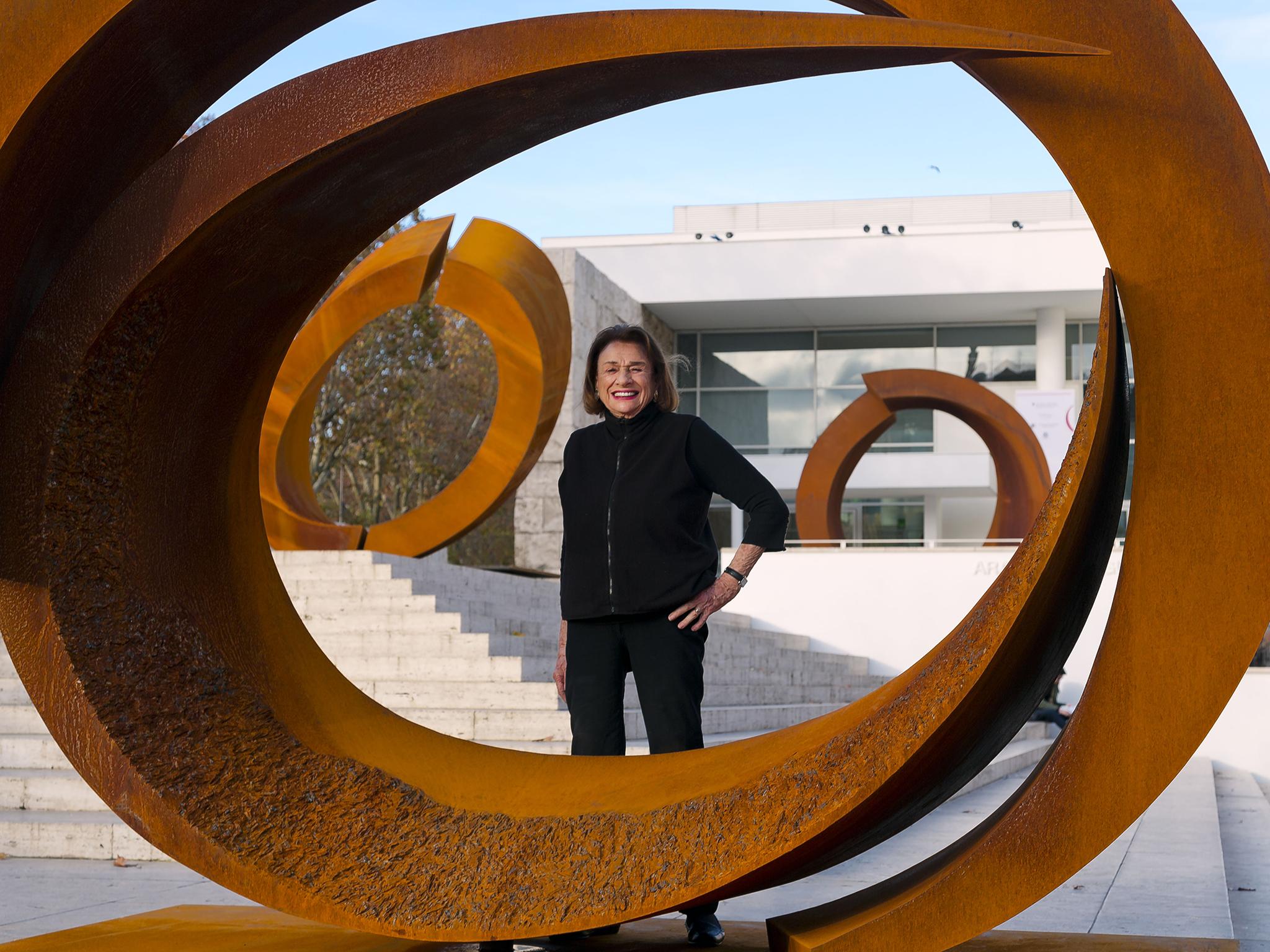 Pepper posing with sculptures from her Curvae in Curvae series in Rome, 2014