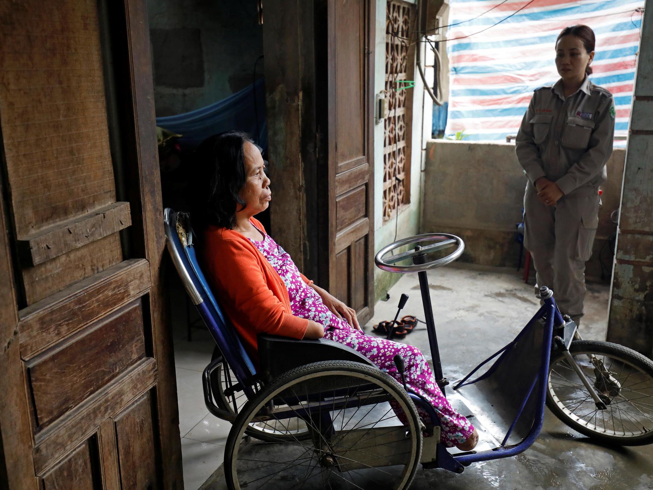 Hoang Thi Hoa and her daughter Nguyen Thi Ha Lan, a member of all-female landmines clearance team at homein Quang Tri province 4 March 2020 REUTERS/Kham