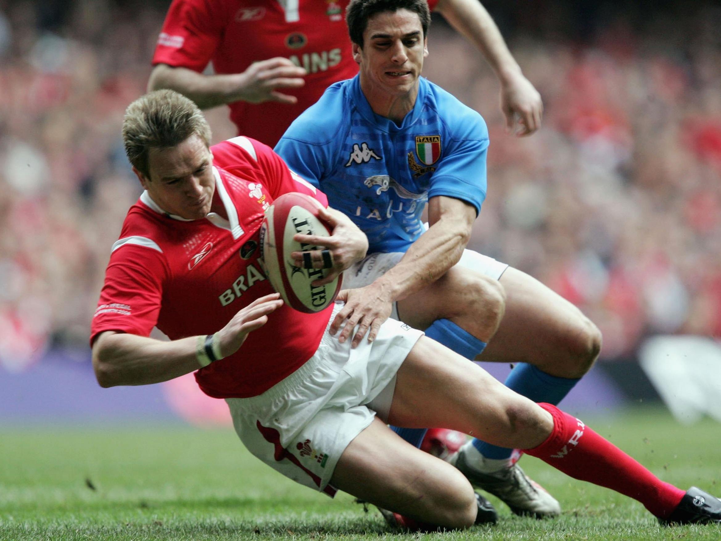 Matthew Watkins in action for Wales against Italy in the Six Nations