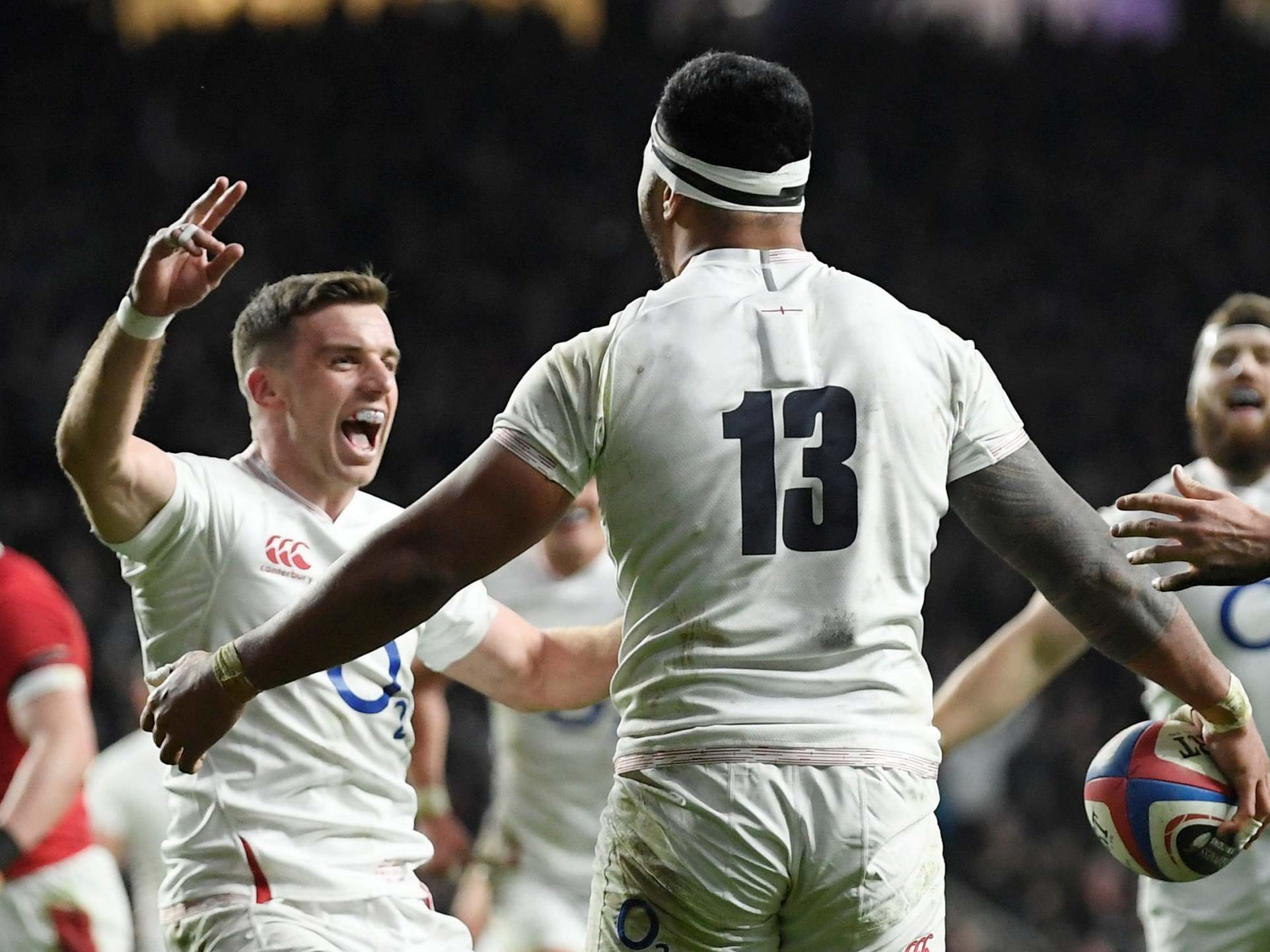 Manu Tuilagi celebrates scoring for England