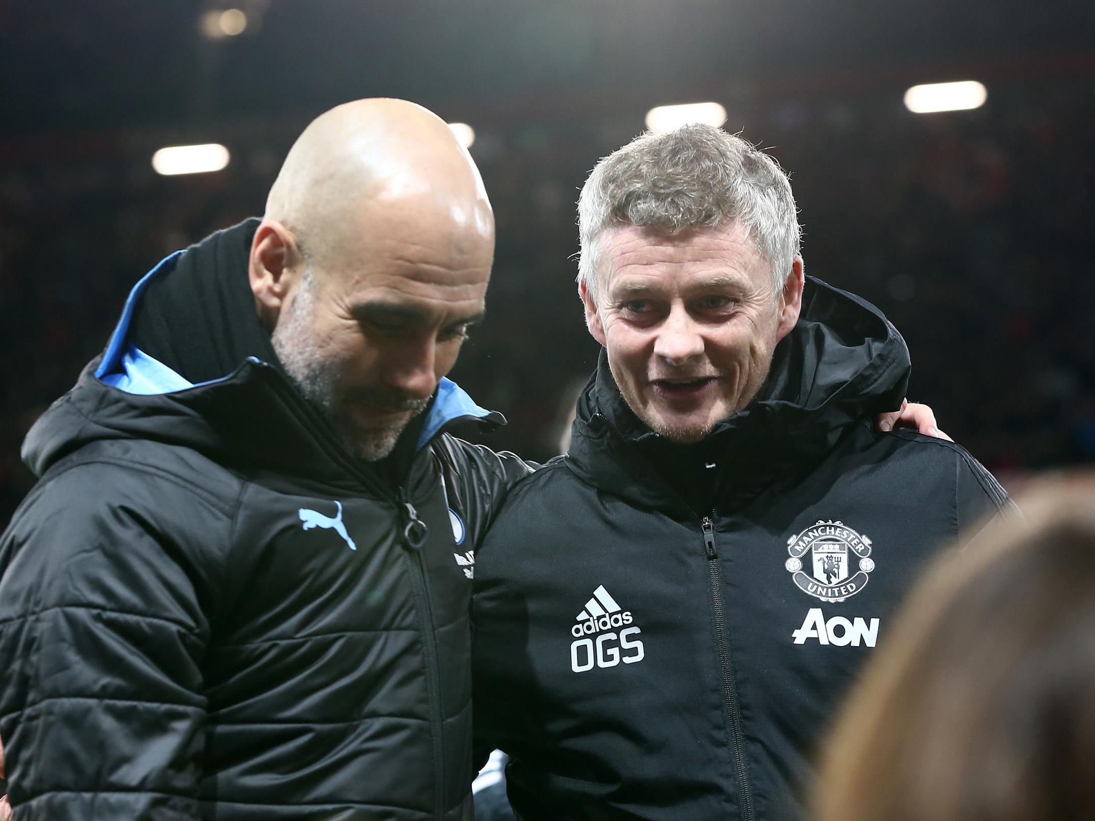 Solskjaer chats with Guardiola pre-game