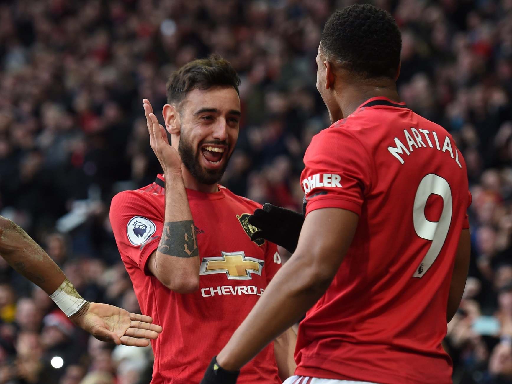 United celebrate taking the lead against City