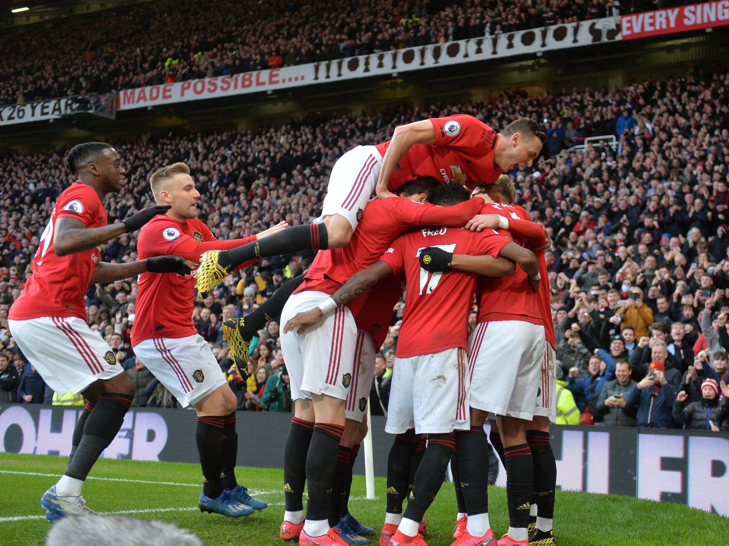 United celebrate taking the lead against City