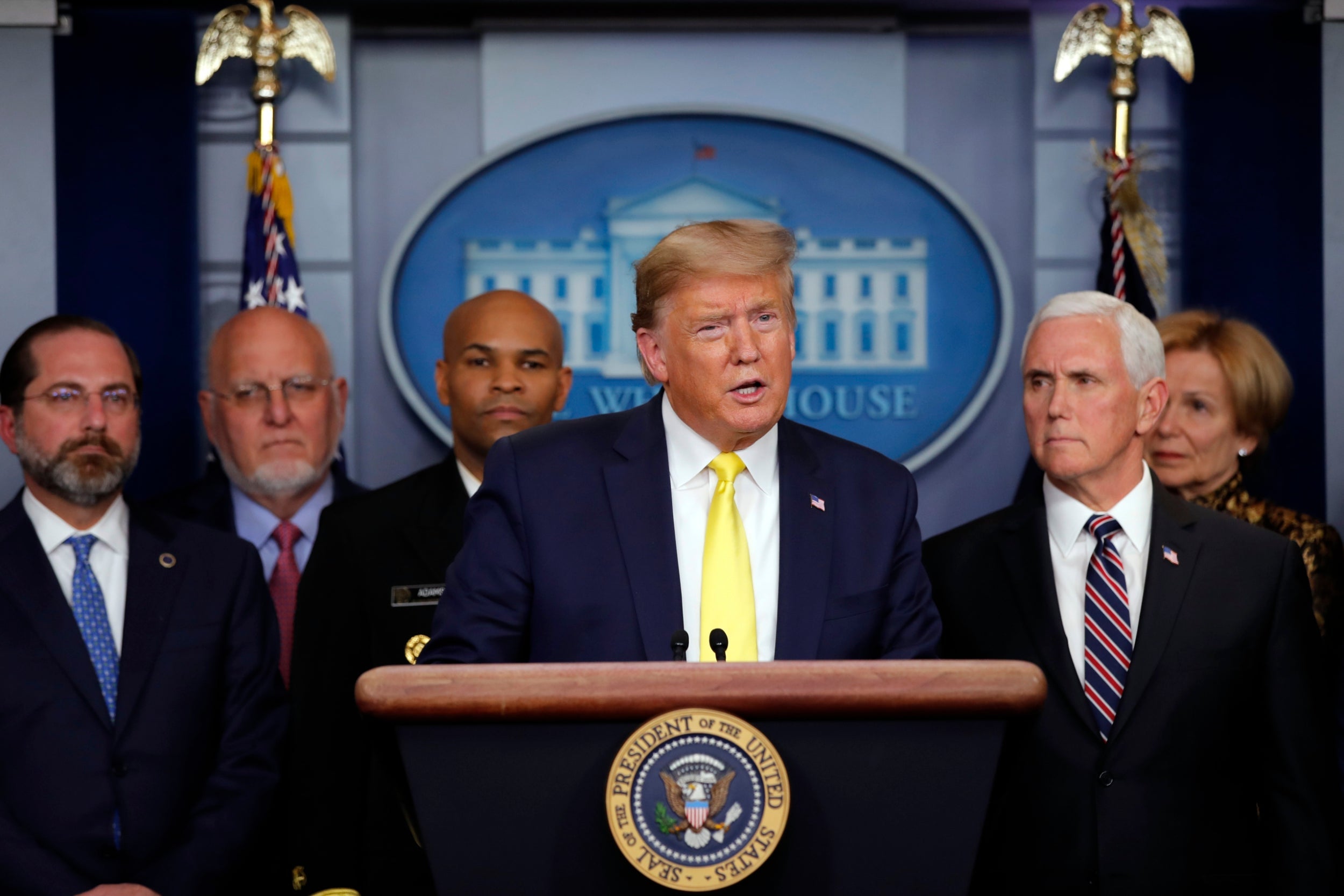 Donald Trump and Mike Pence will continue to shake hands to greet people despite warnings to avoid contact.