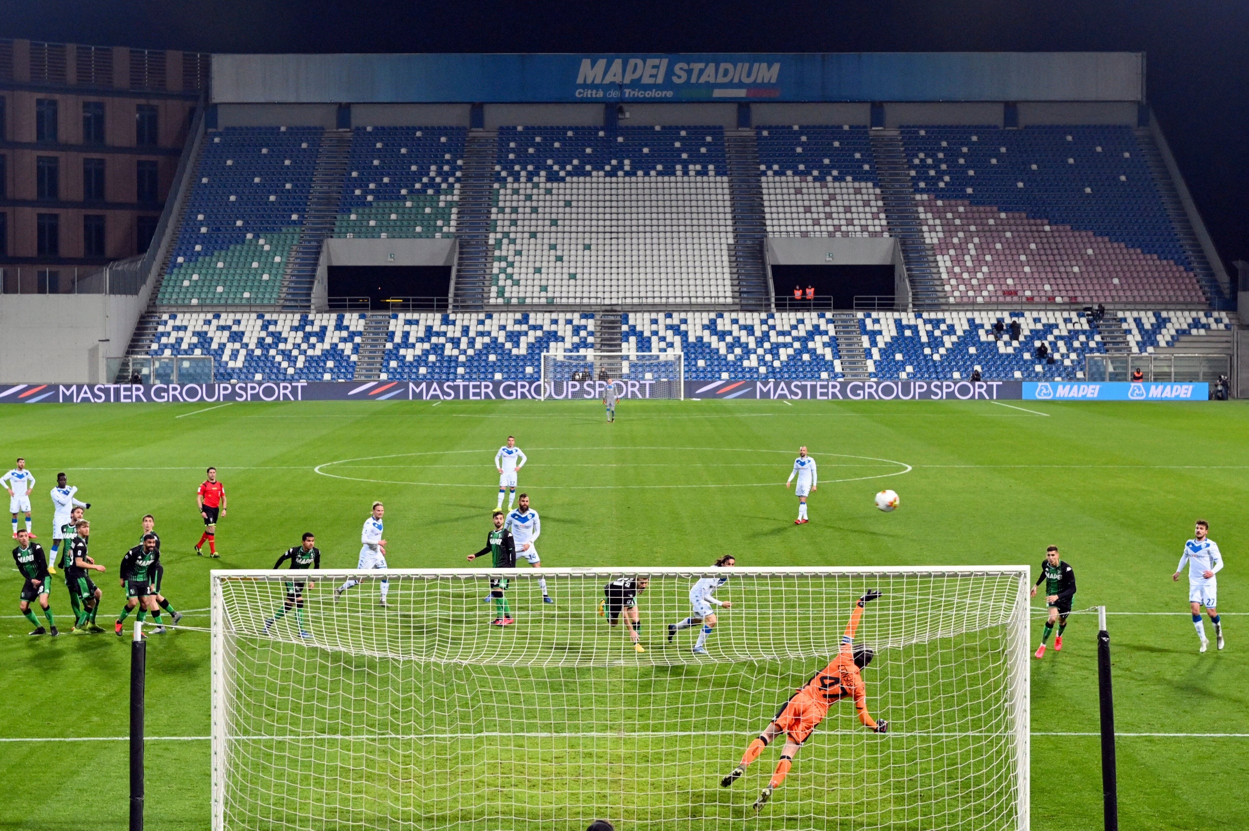 Empty stands during a football match between Sassuolo and Brescia at the Mapei stadium in Reggio Emilia, northern Italy on 9 March