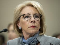 Congress asked to investigate Betsy DeVos over brother spy claims