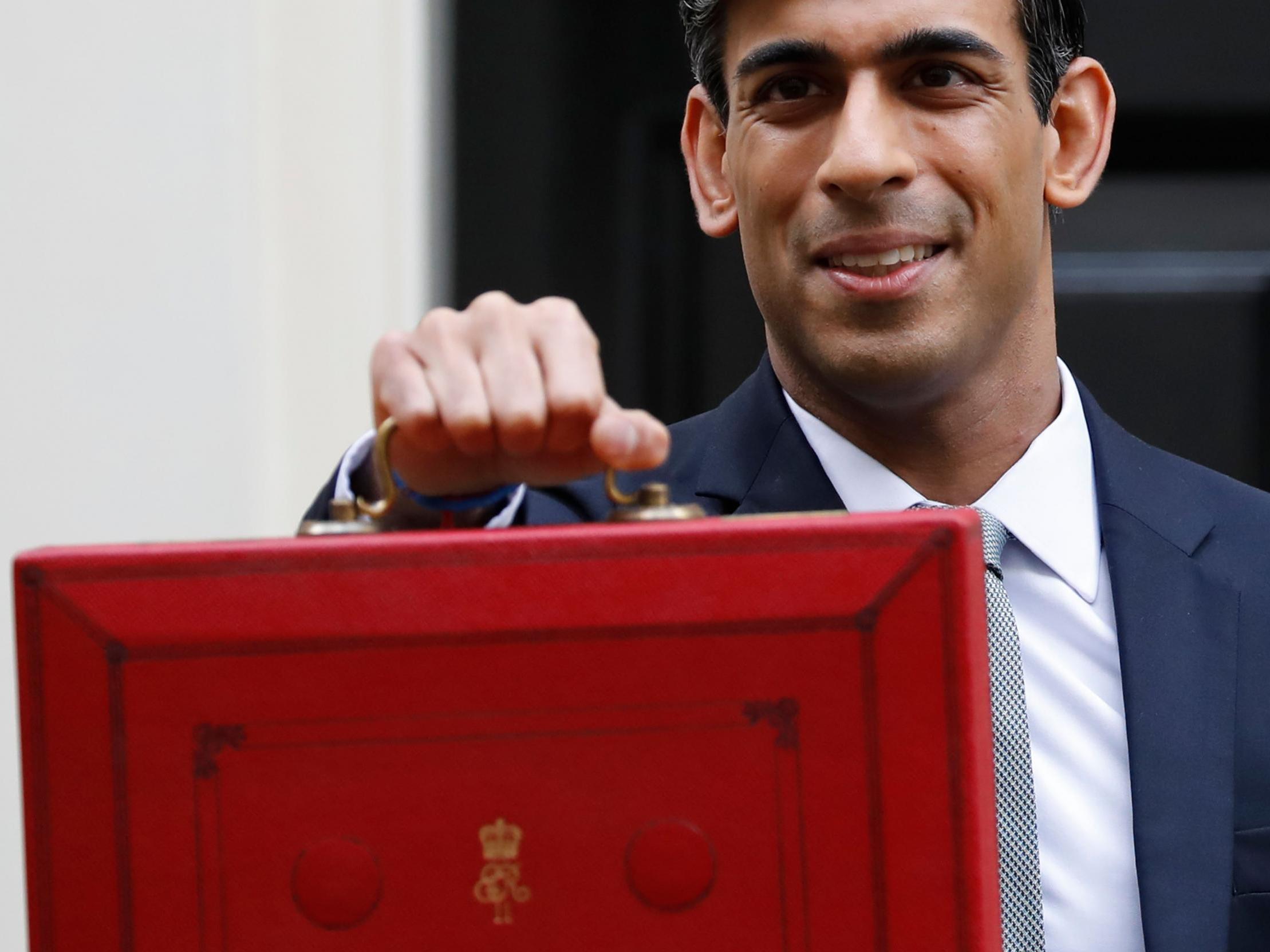 Rishi Sunak poses with the Budget Box ahead of the government’s announcement