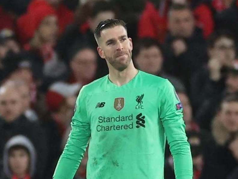 Liverpool's Adrian looks dejected