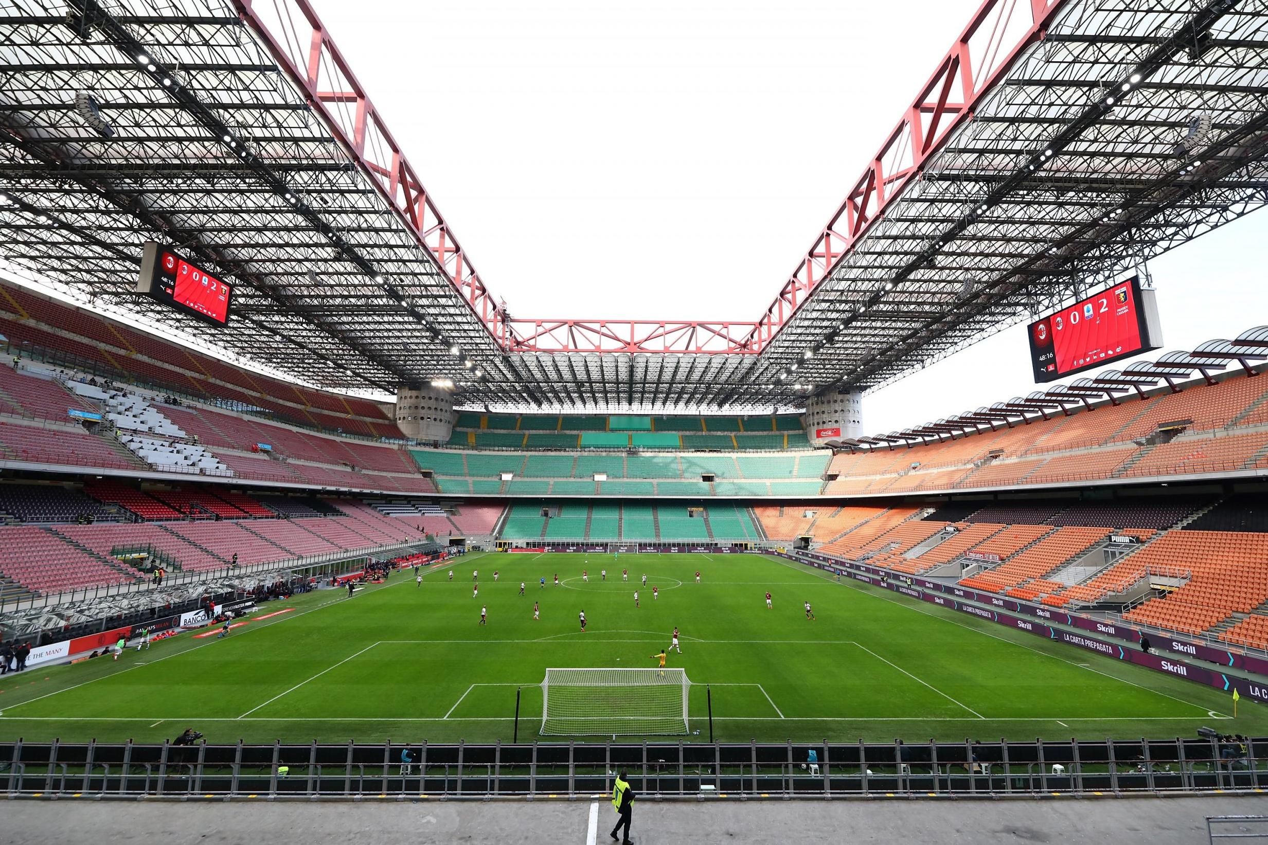 Serie A rivals AC Milan and Genoa play inside an empty San Siro stadium earlier this month (Getty)