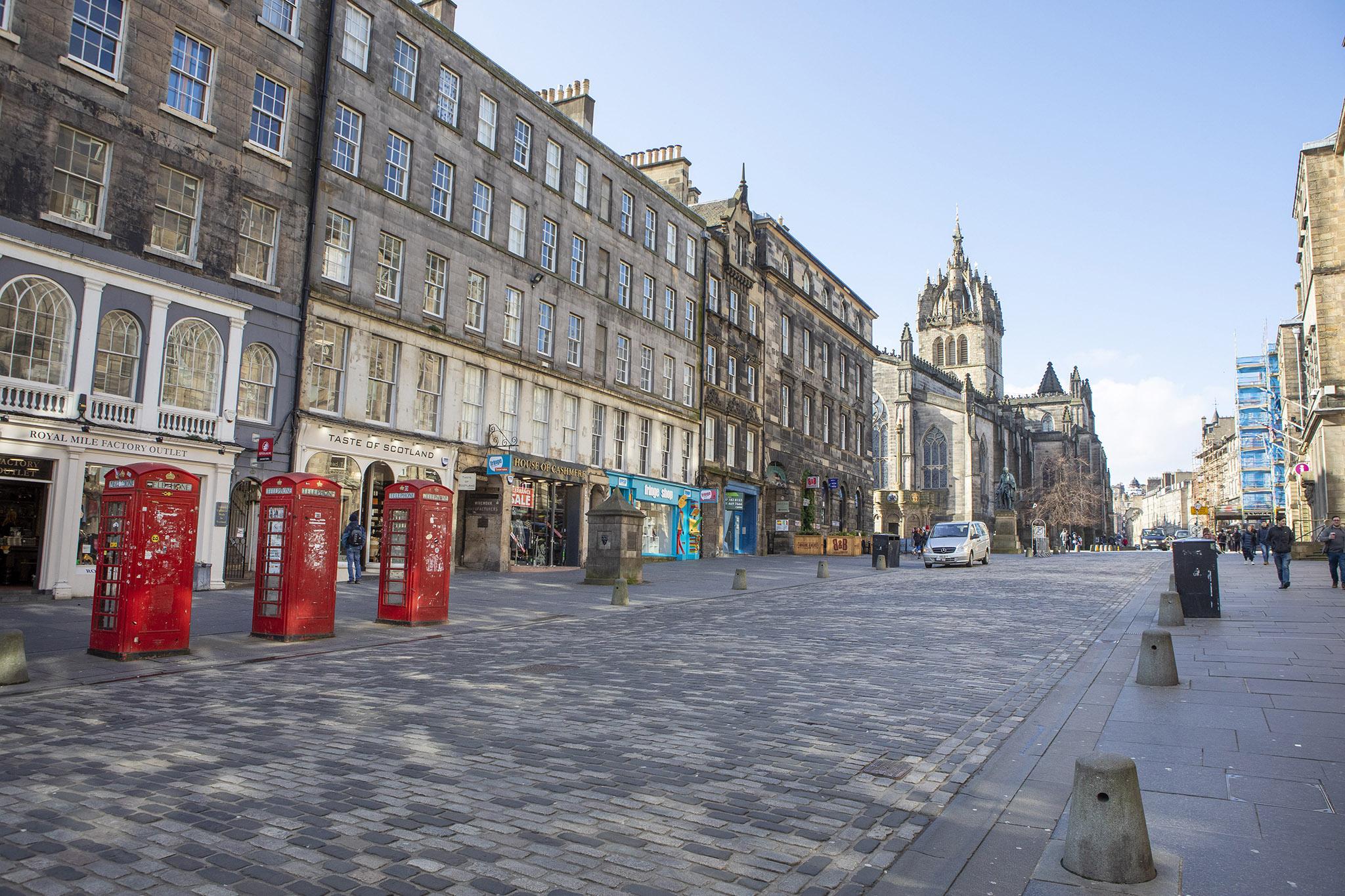 The usually busy Royal Mile in Edinburgh is empty as people stay away from public areas amid the coronavirus outbreak on 13 March