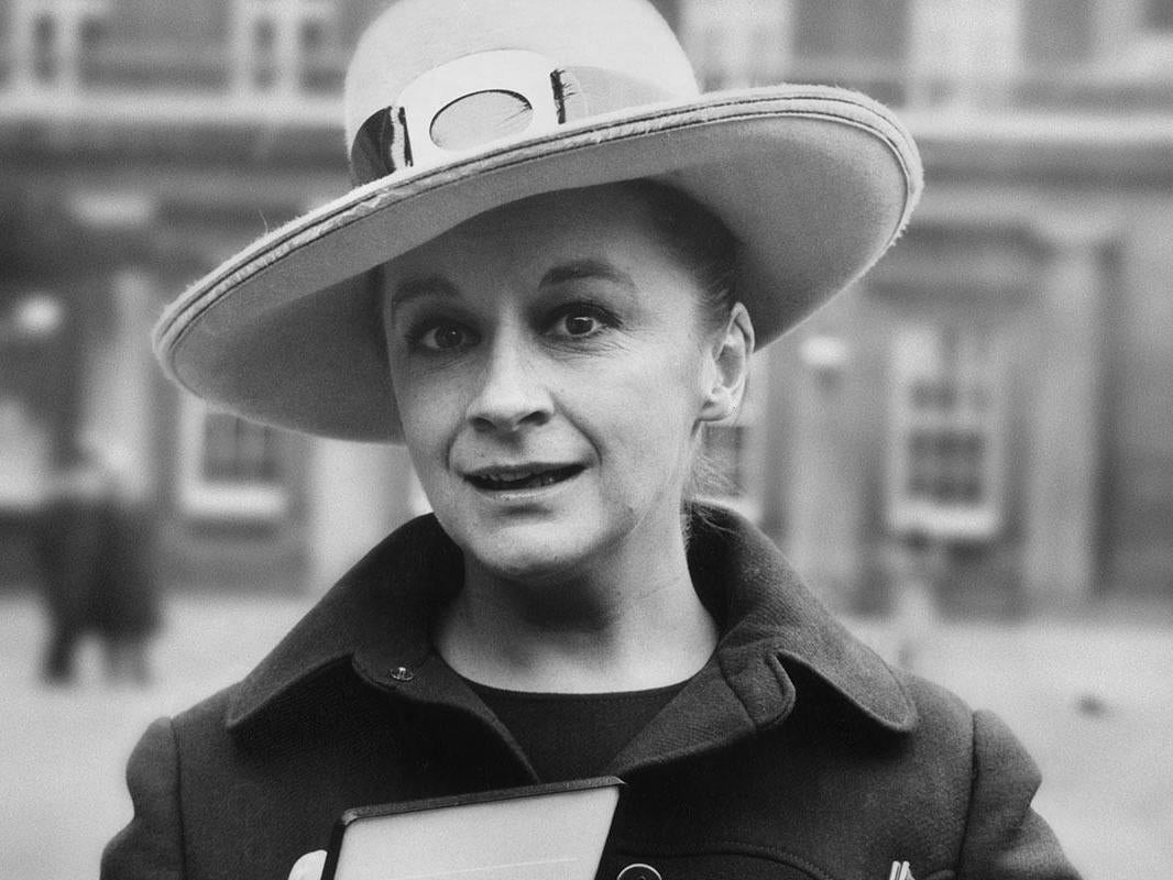 Caldwell receiving an OBE at Buckingham Palace in 1970