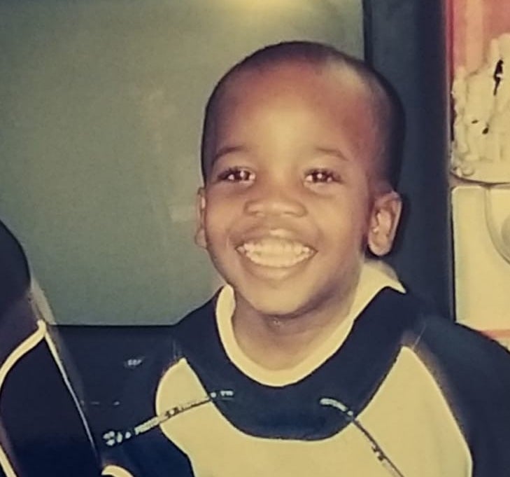 Osime Brown as a child in his family home