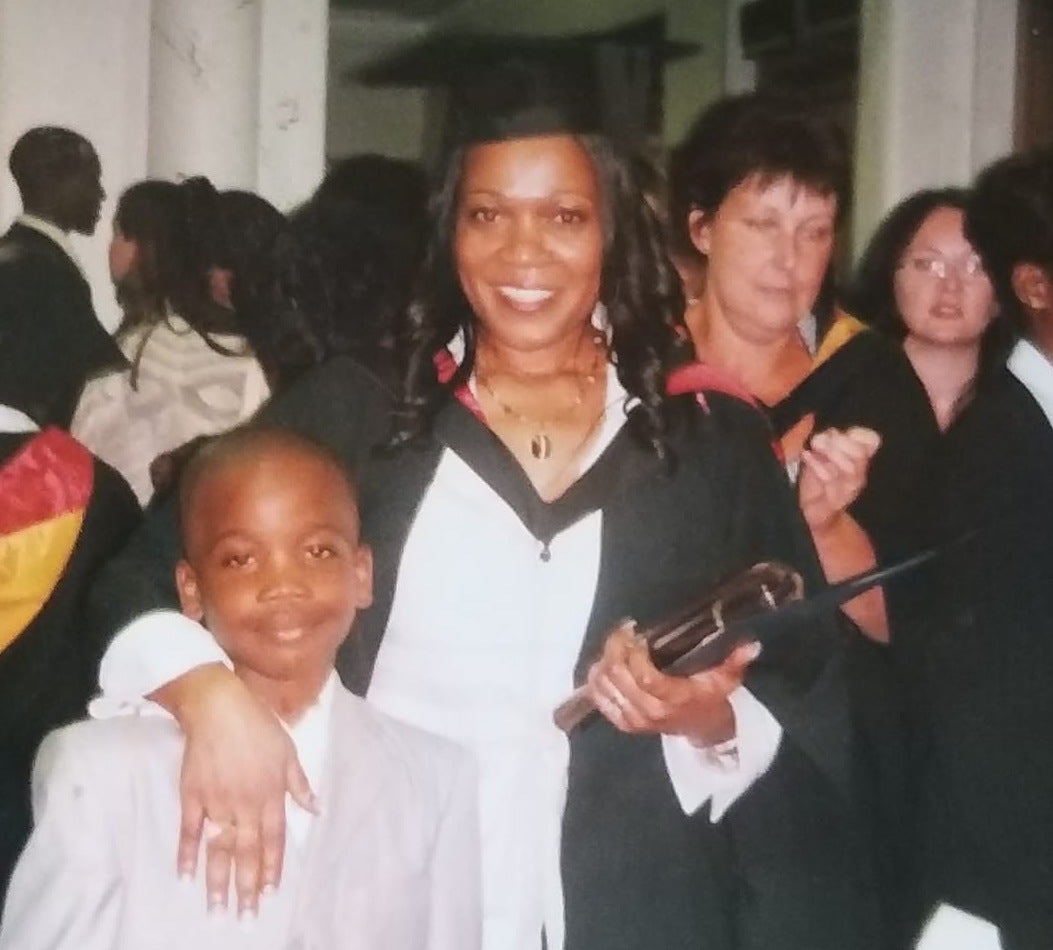 Osime as a child with his mother, Joan Fairclough