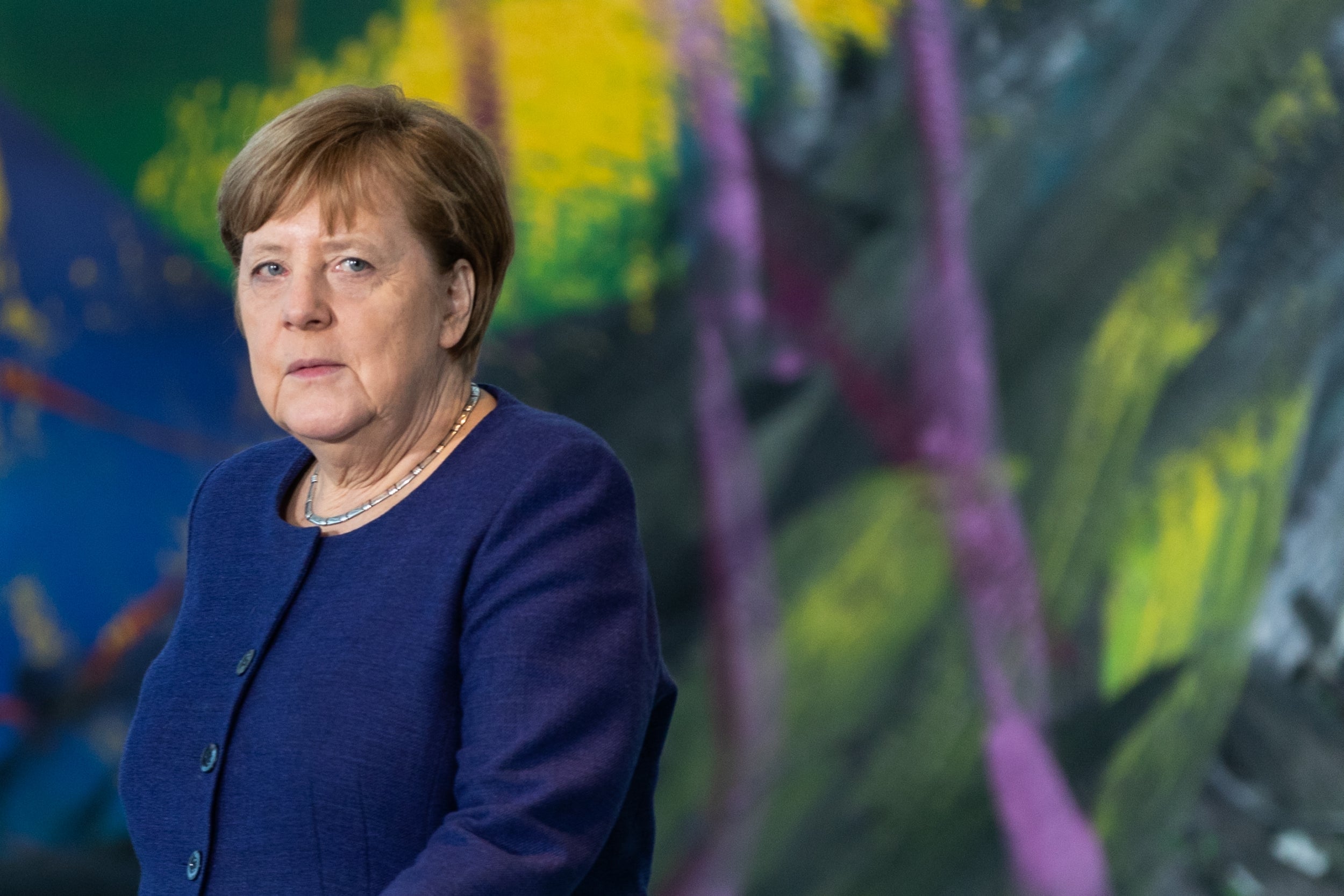 Merkel has twice tested negative for the virus herself but continues to work from home (Getty)