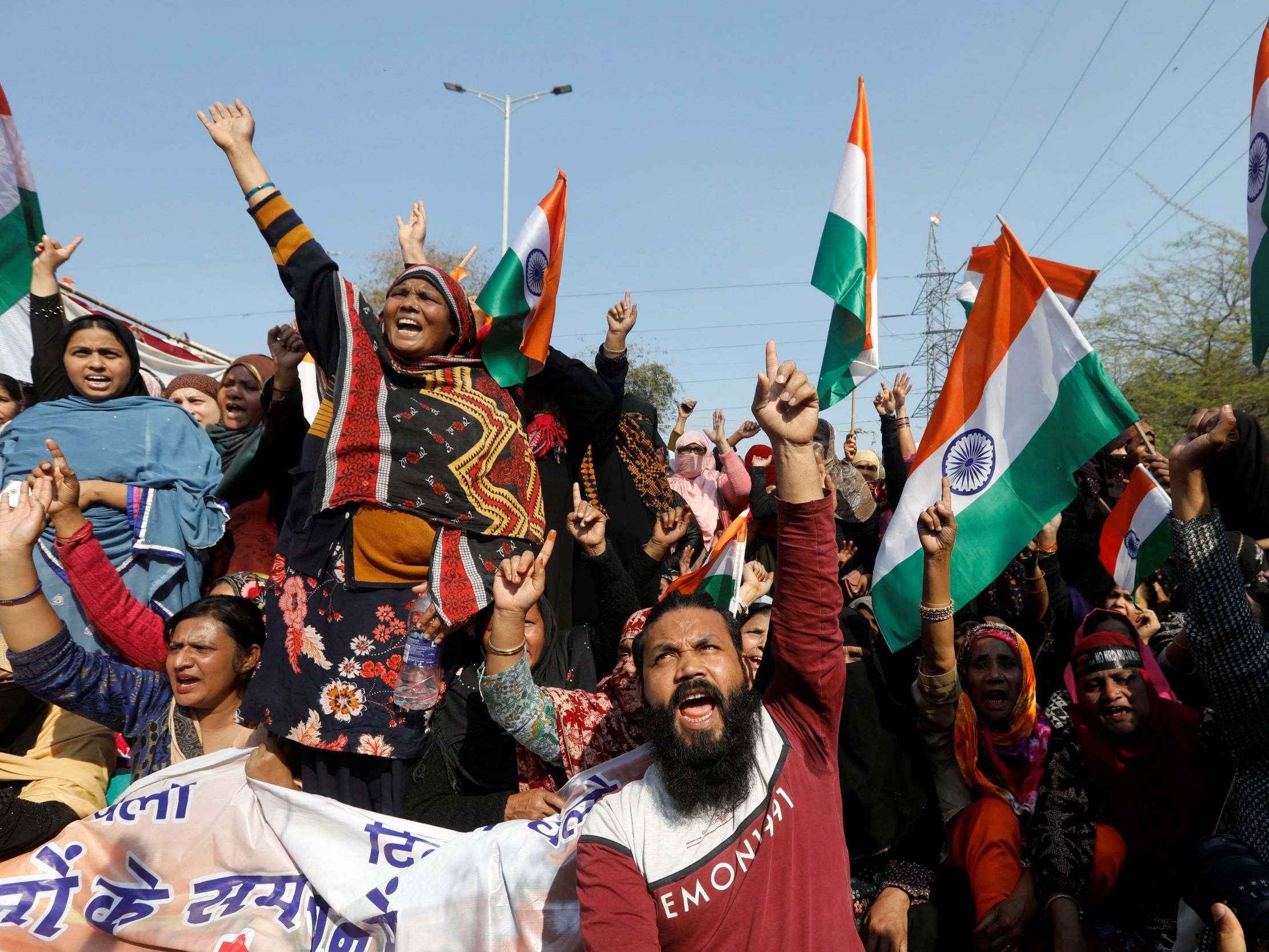 Protesters at Shaheen Bagh, Delhi, shout slogans against new citizenship laws on 16 February