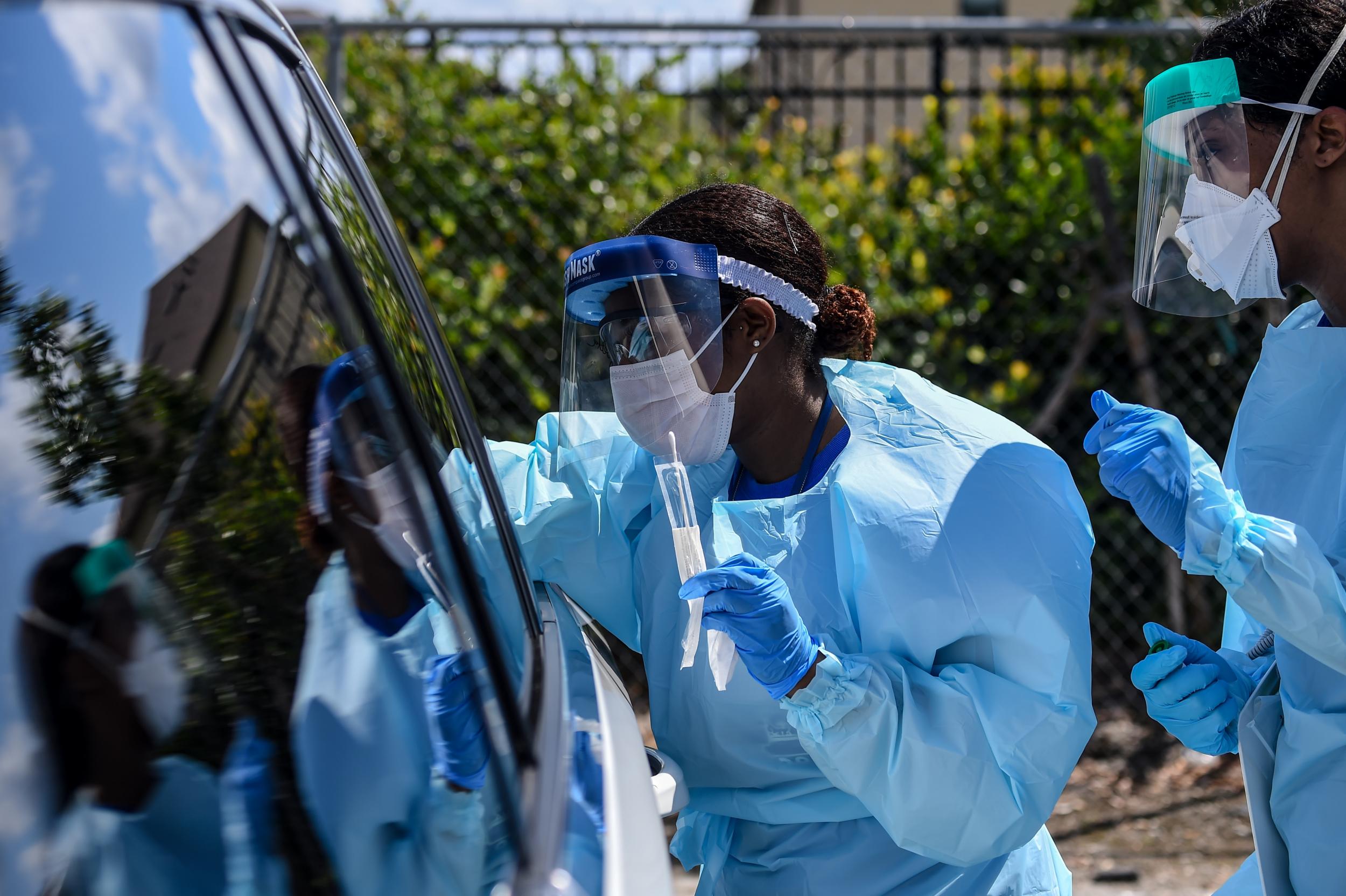 It places such as Florida health workers have been carrying out drive-thru testing