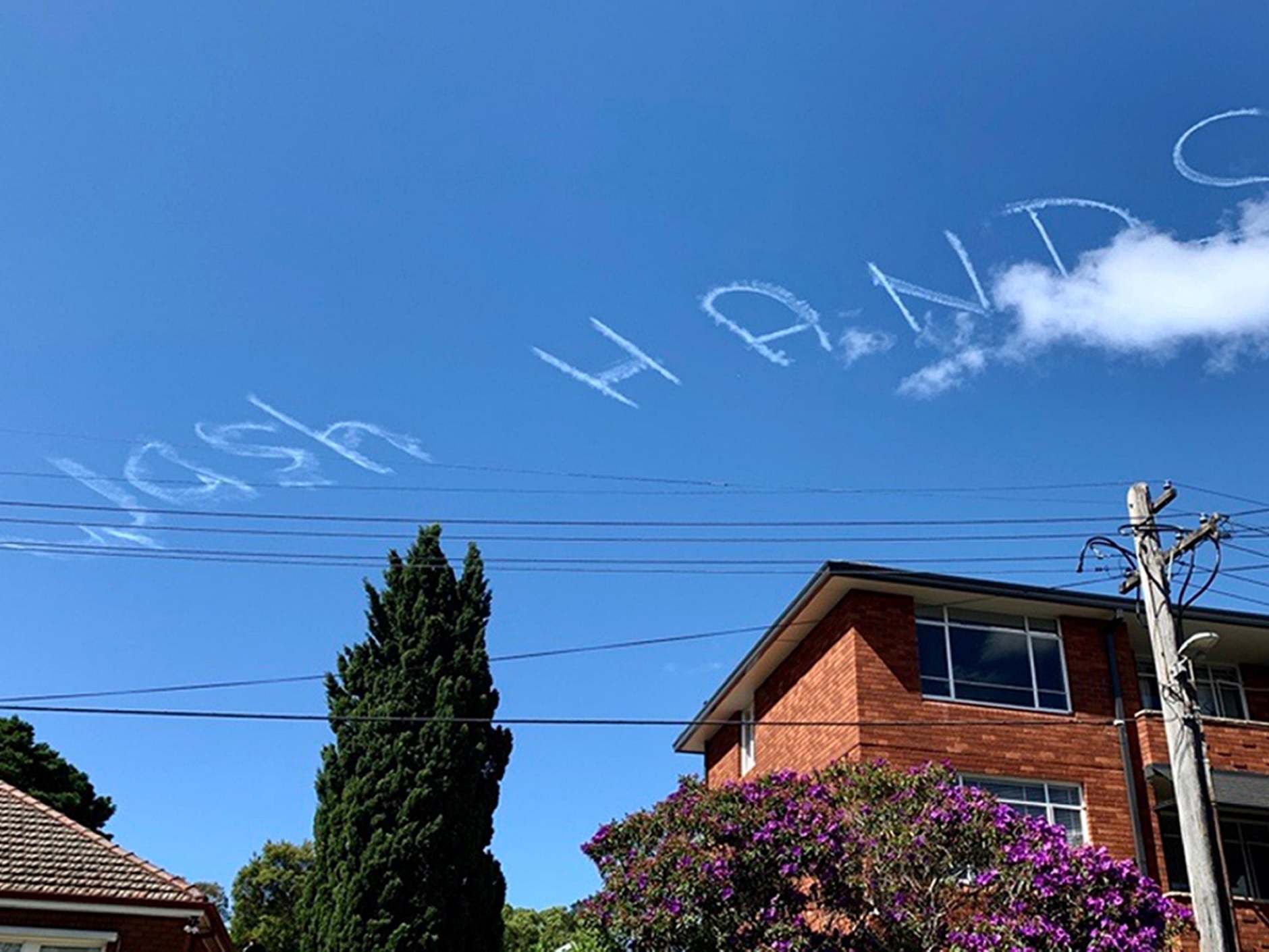 Health advice written in the sky above Sydney in Australia during the coronavirus pandemic