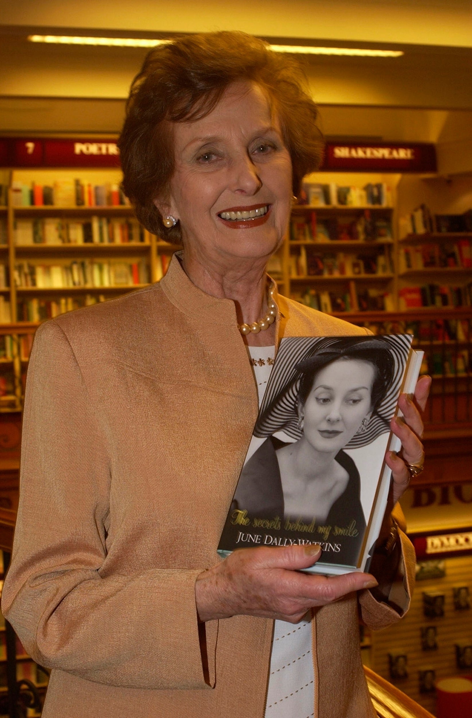 Behind the smile: at the launch of her revealing autobiography in 2002