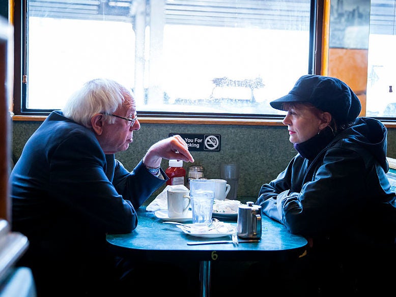 Hopeful: Sarandon sits with US presidential candidate Bernie Sanders in 2016 (Eric Thayer/Getty)