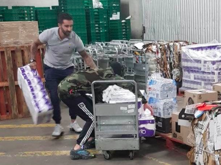 Police image of two men suspected of stealing toilet paper from storage rooms