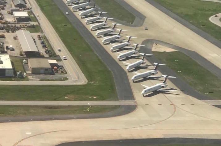 Delta planes are parked on an Atlanta airport runway