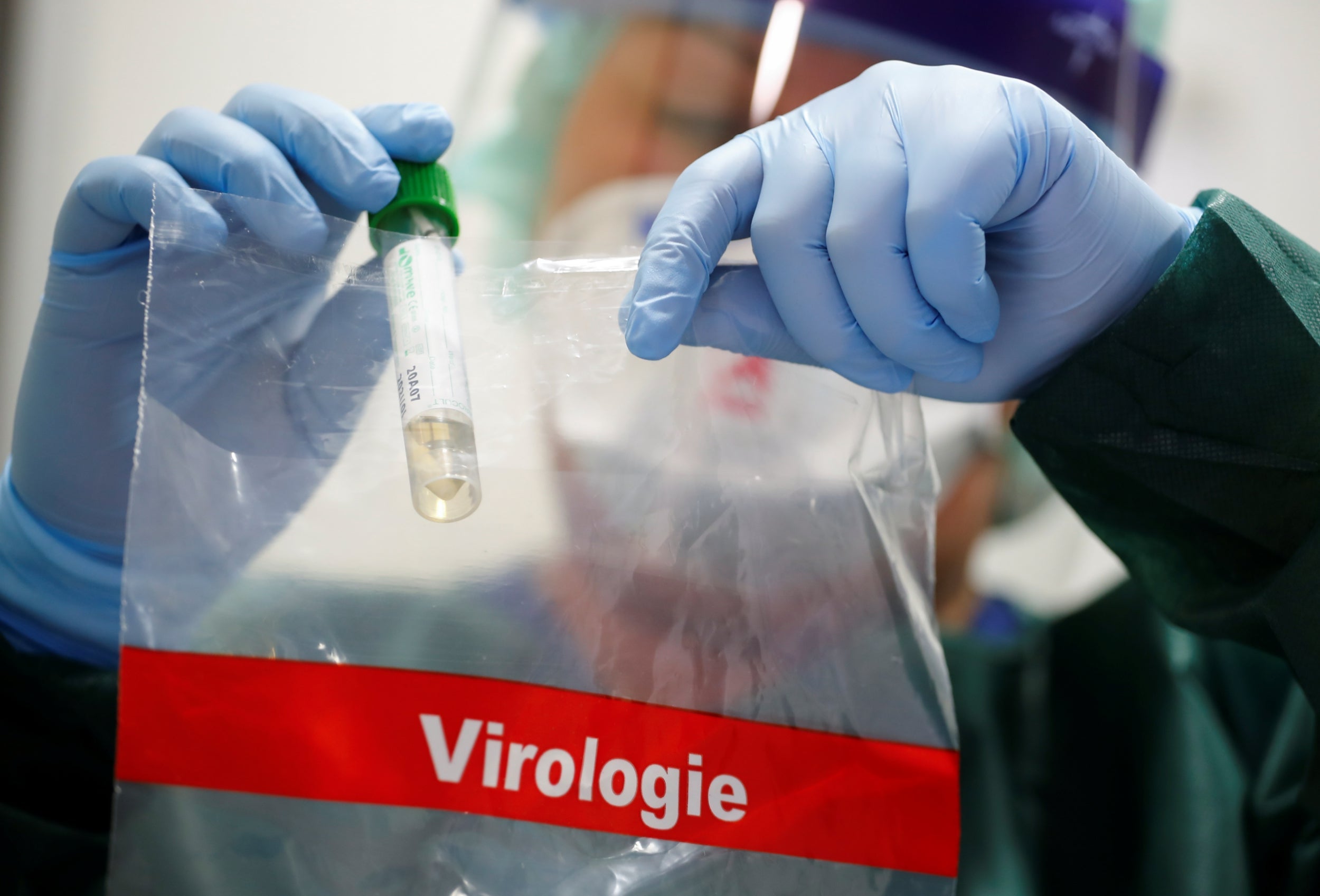 A nurse in Germany gets a coronavirus test ready