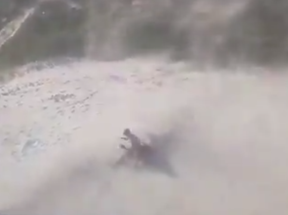 A police helicopter in the state of Santa Catarina creates a sandstorm to dispel sunbathers during a coronavirus lockdown.