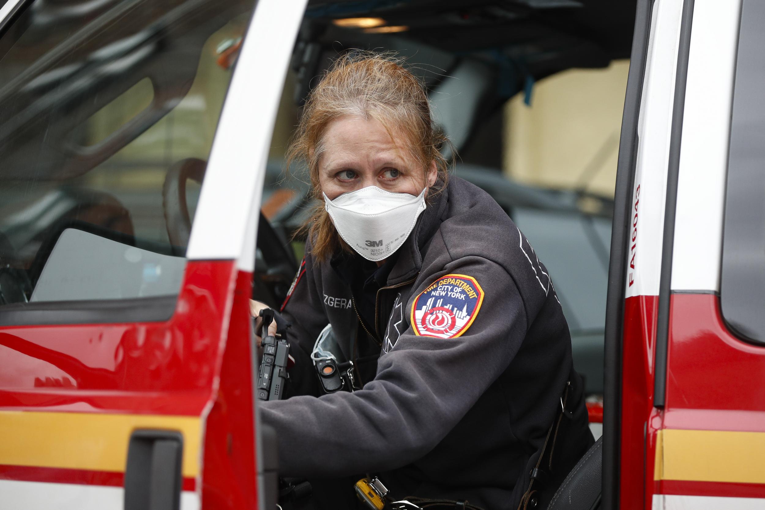Medical staff, like this ambulance driver in New York, are being stretched to their limits amidst the coronavirus