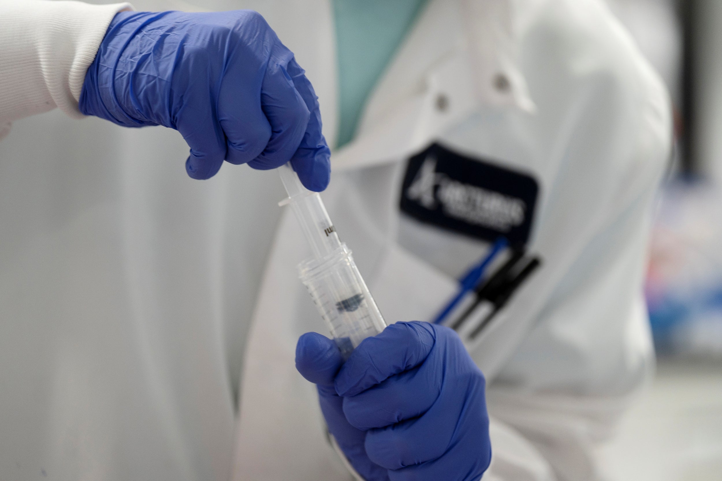 A scientist conducts research on a vaccine for the novel coronavirus (COVID-19) at the laboratories of RNA medicines company Arcturus Therapeutics in San Diego, California, U.S., March 17, 2020