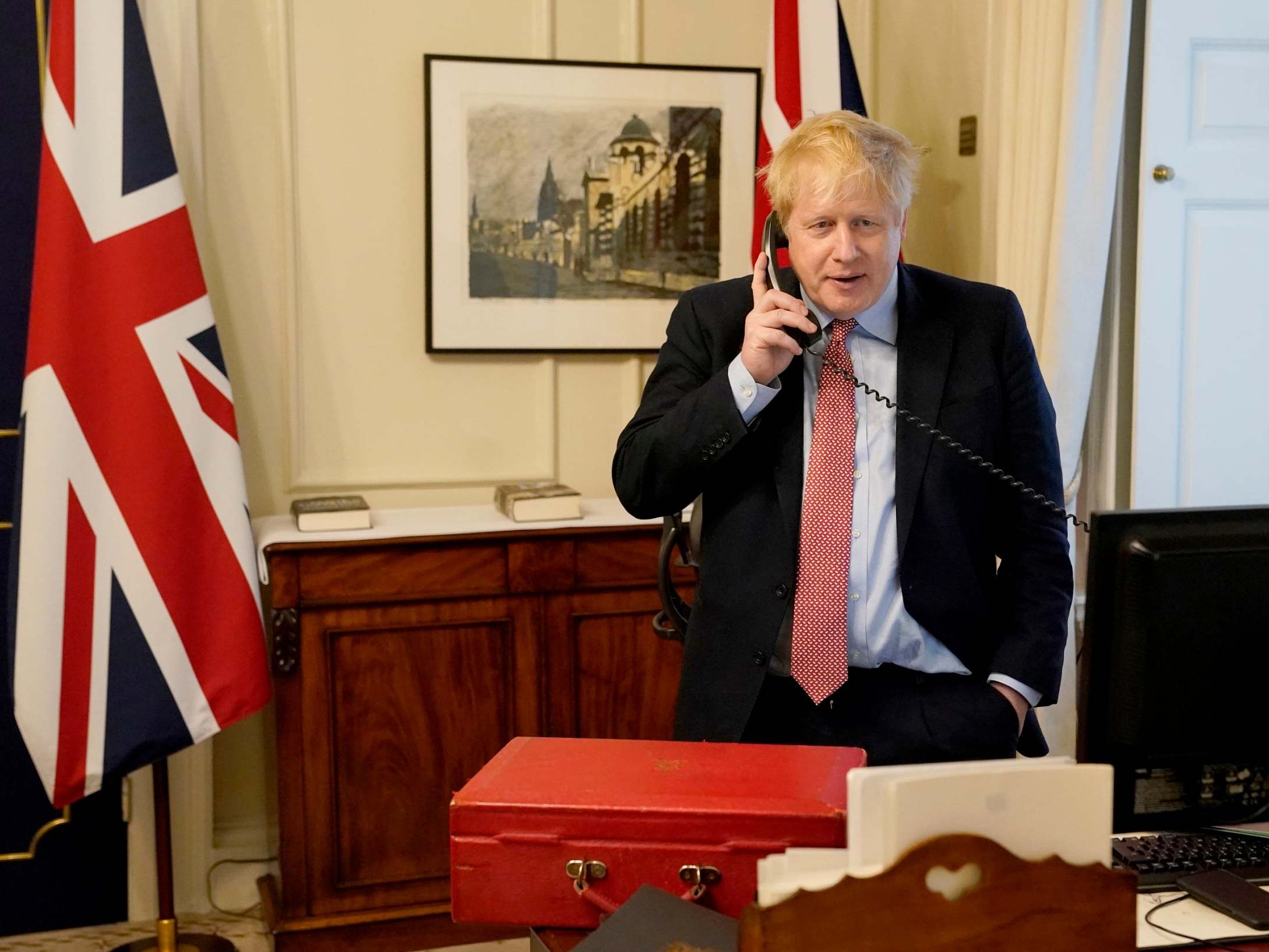 The prime minister speaks to the Queen during their weekly audience, 25 March