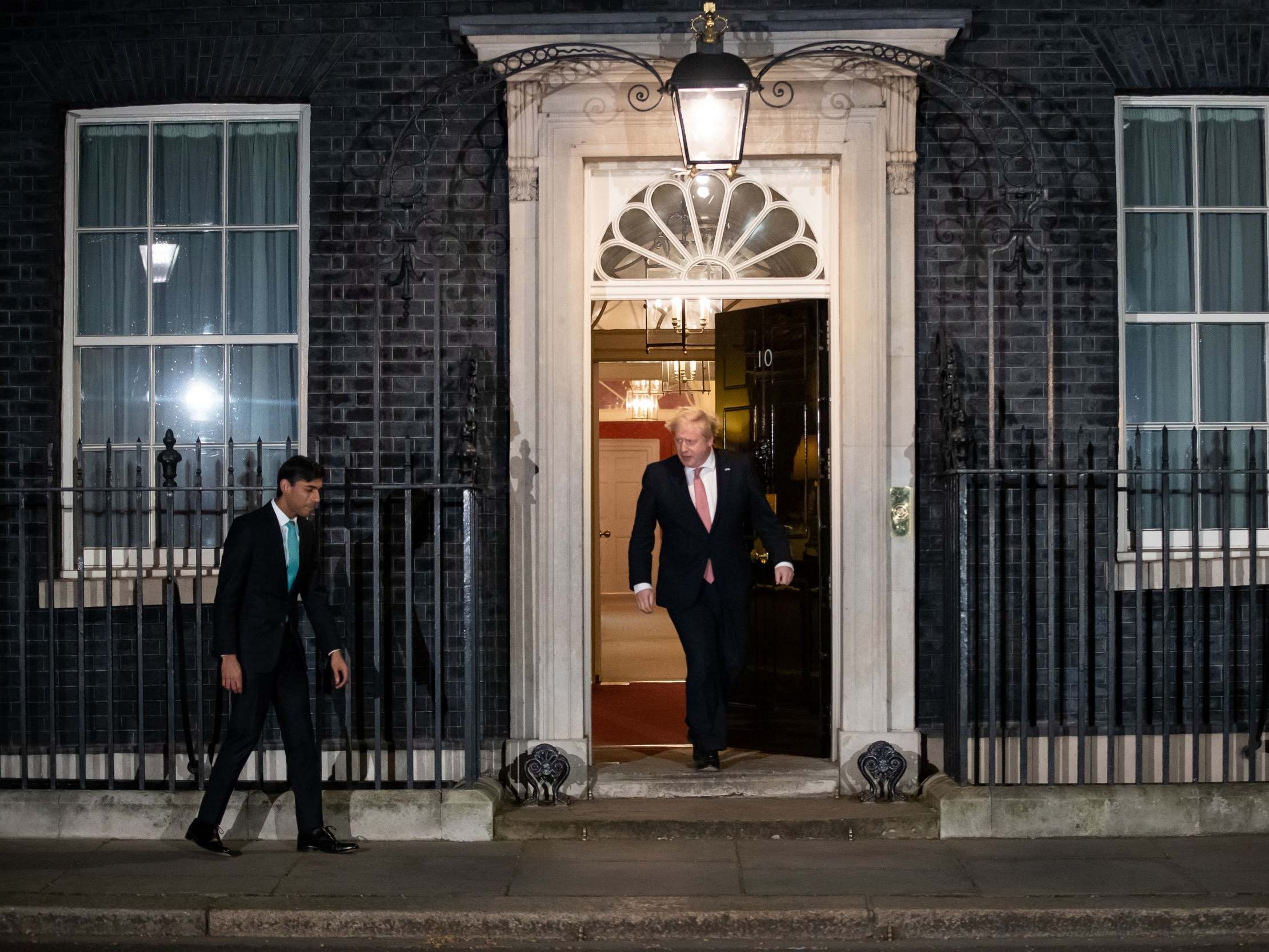 Boris Johnson and Rishi Sunak take part in the national Clap for Our Carers event on Thursday evening