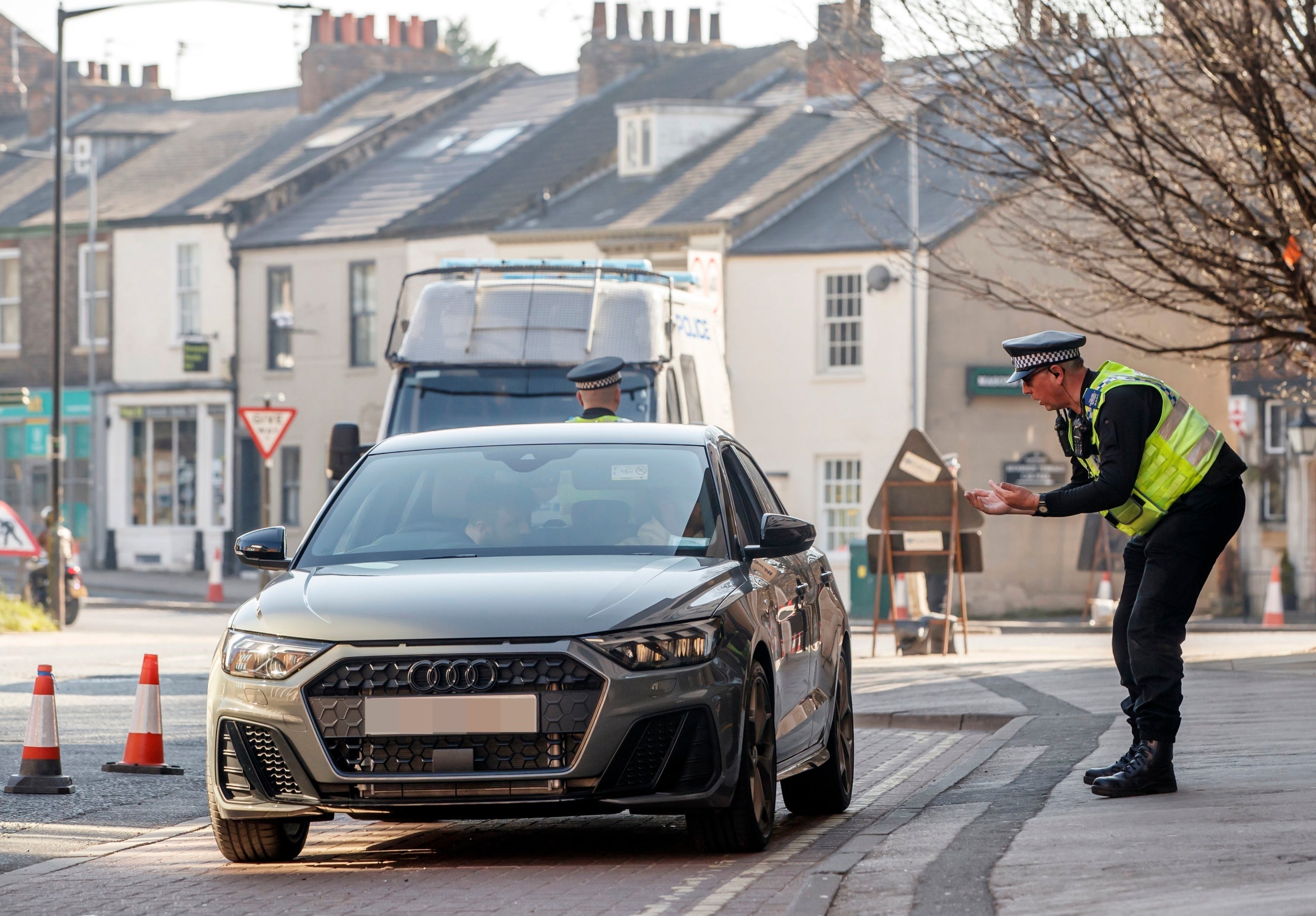 Police at a vehicle checkpoint in York where officers from North Yorkshire Police were ensuring that motorists and their passengers are complying with government restrictions on 26 March