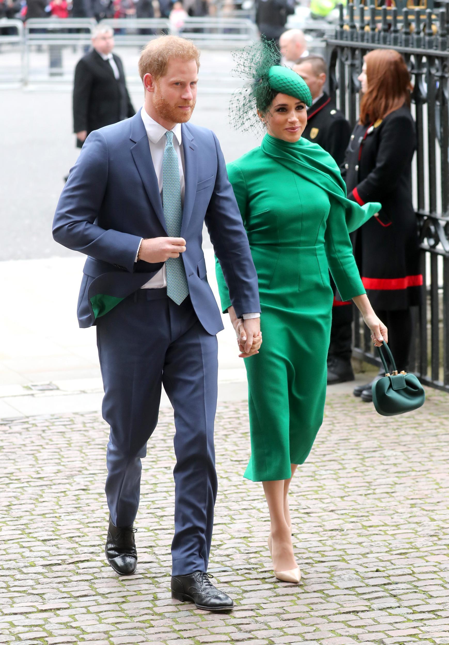 The lining in Harry's suit jacket was made in the same colour as Meghan's dress (Getty)